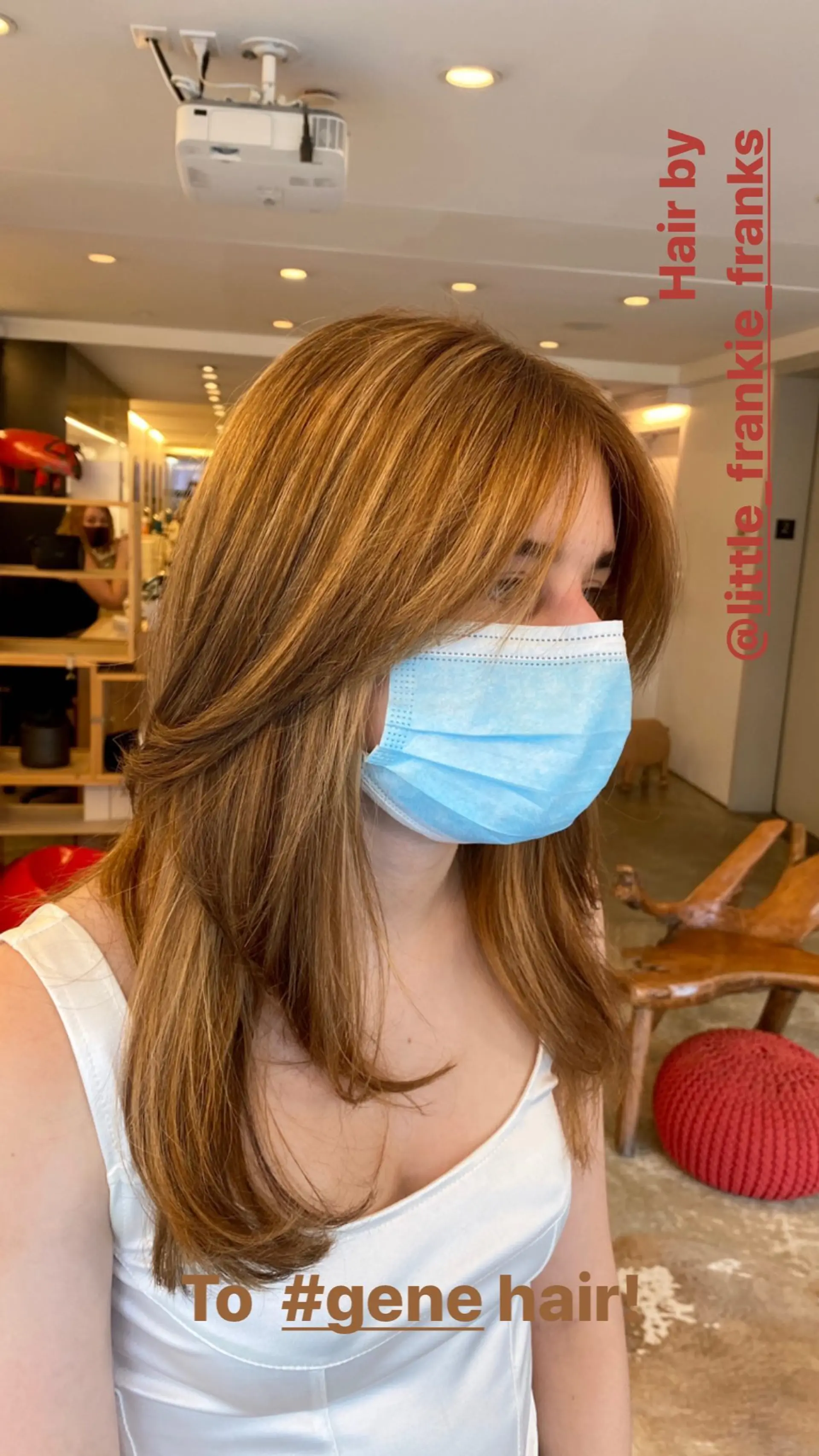 This hairstyle features long layers and curtain bangs styled into a blowout. 1