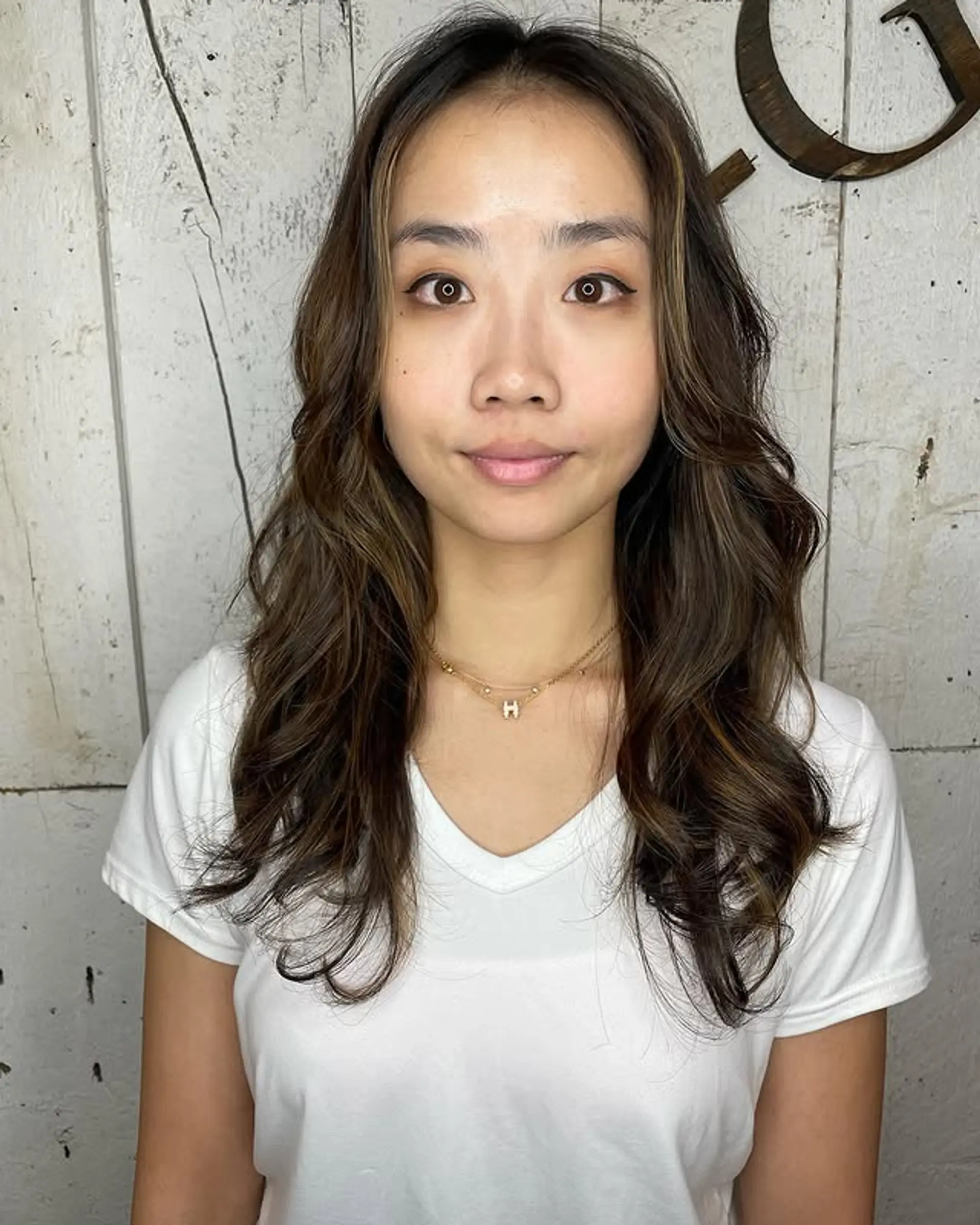 A wavy, medium-length style with dimensional highlights. 1