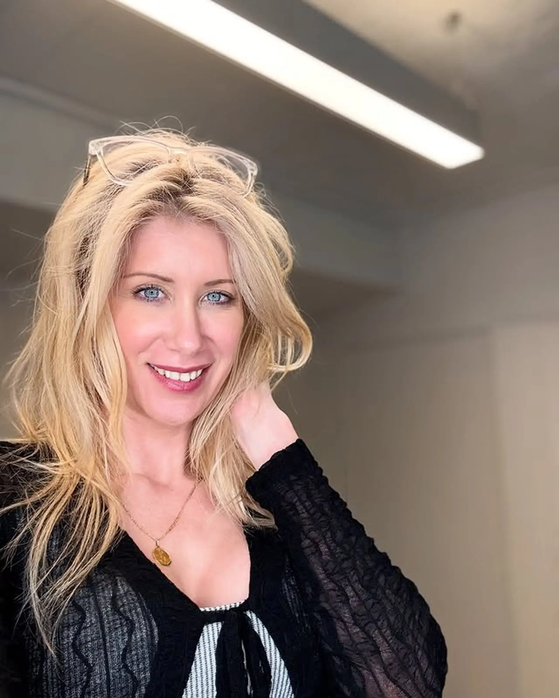 A layered, wavy hairstyle with a beachy vibe. 1