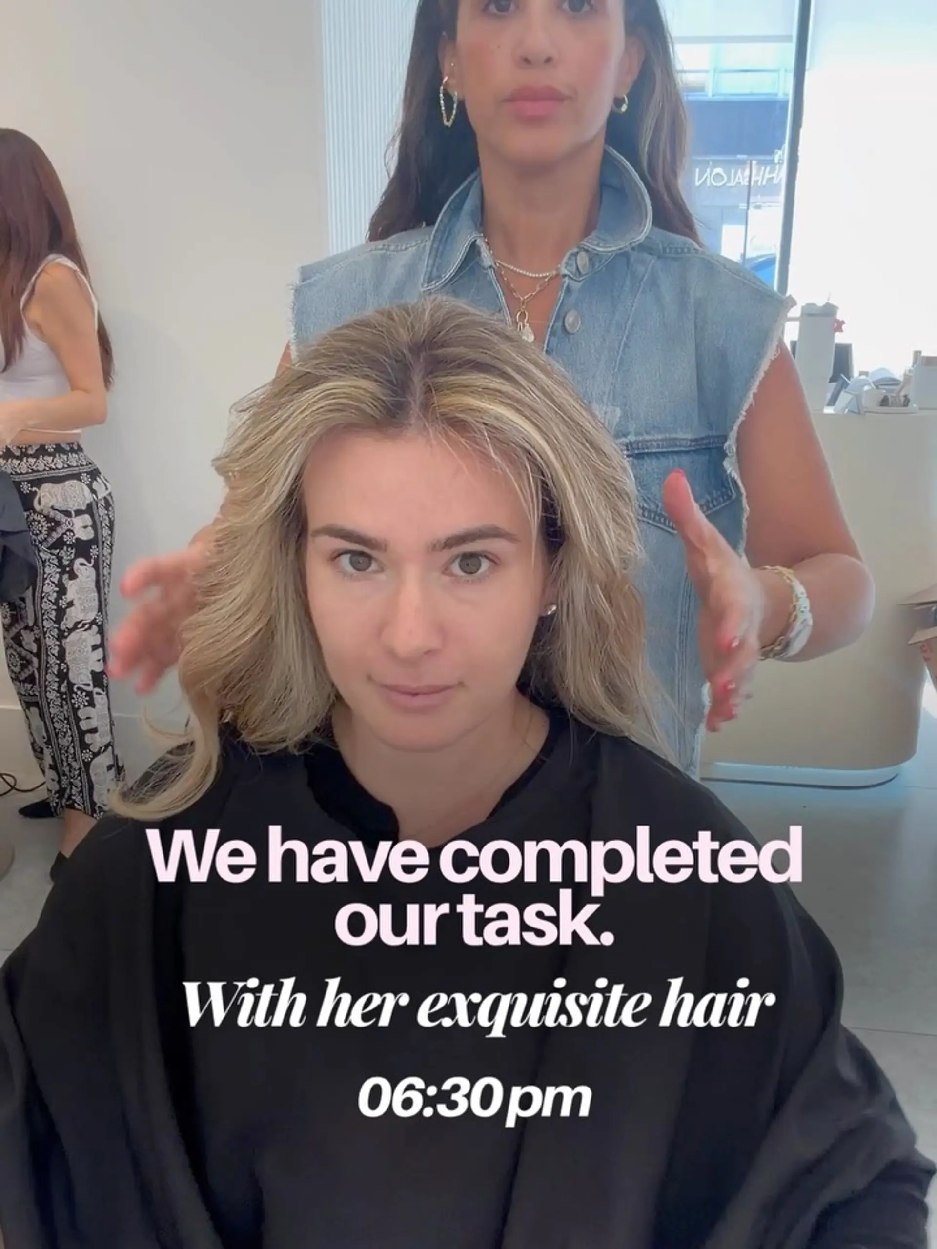 Dimensional blonde hair styled into soft, voluminous waves with a middle part. 1