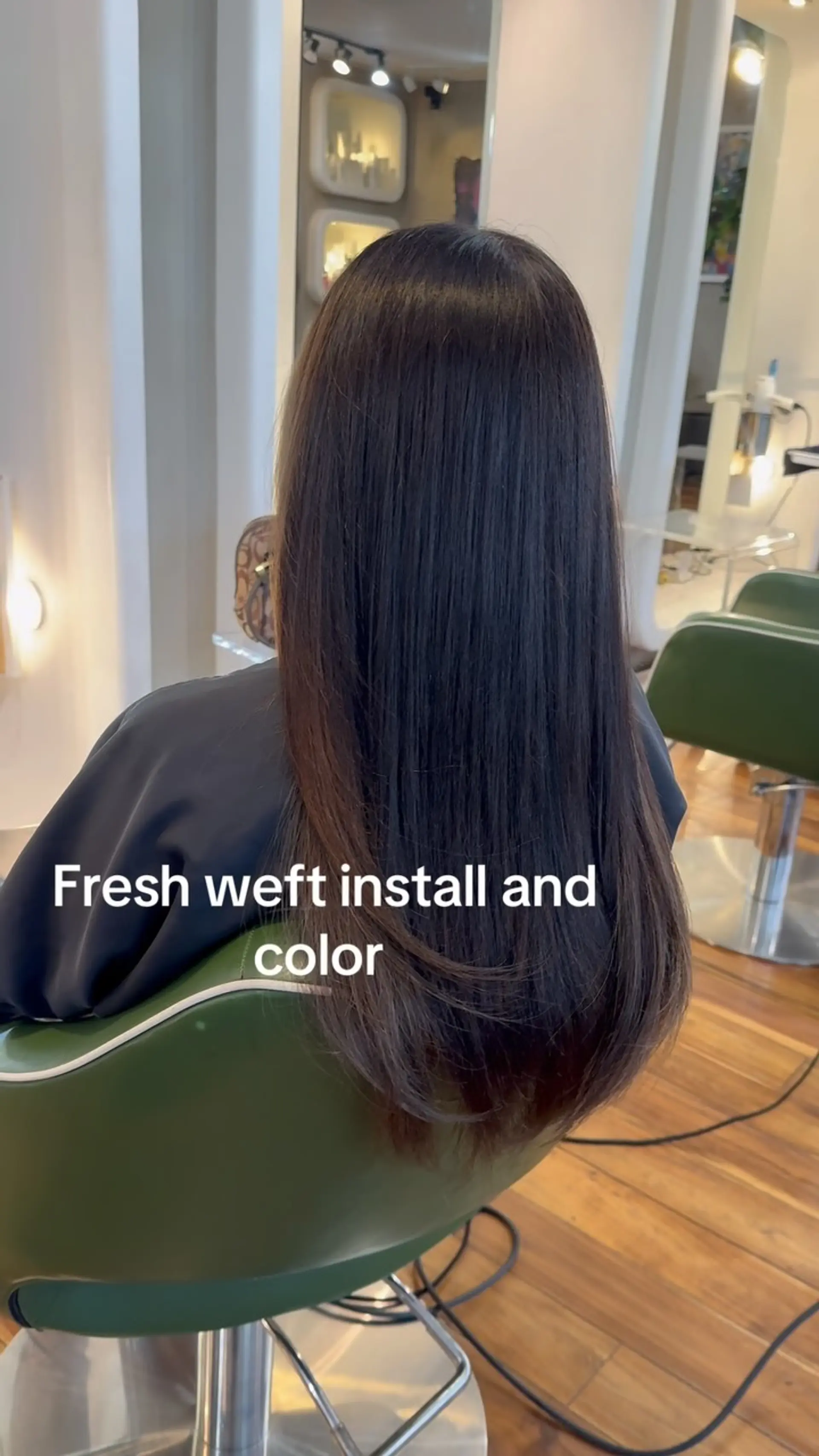 Long, straight dark brunette hair styled sleek with soft movement at the ends. 1
