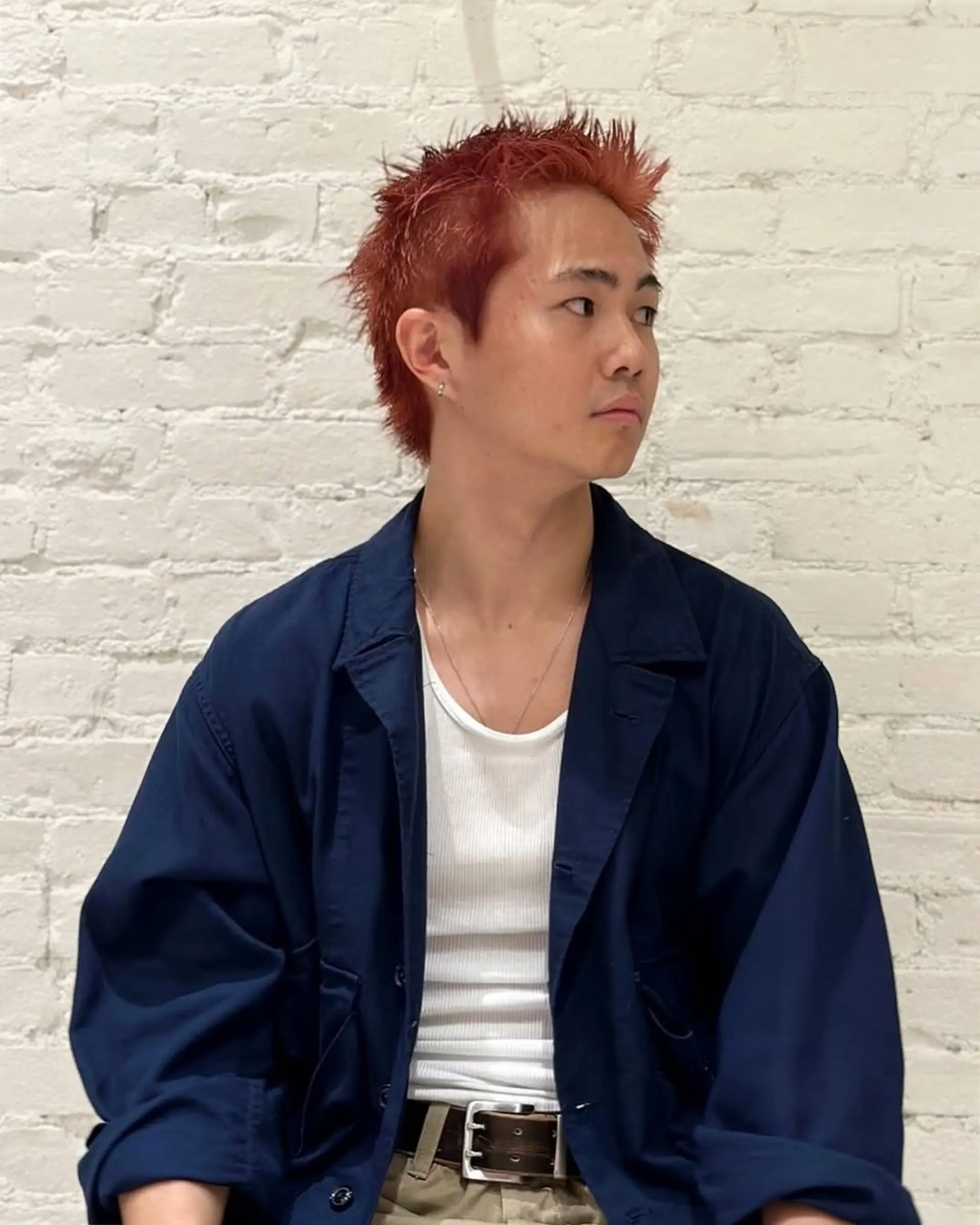 A spiky, textured short hairstyle. 1