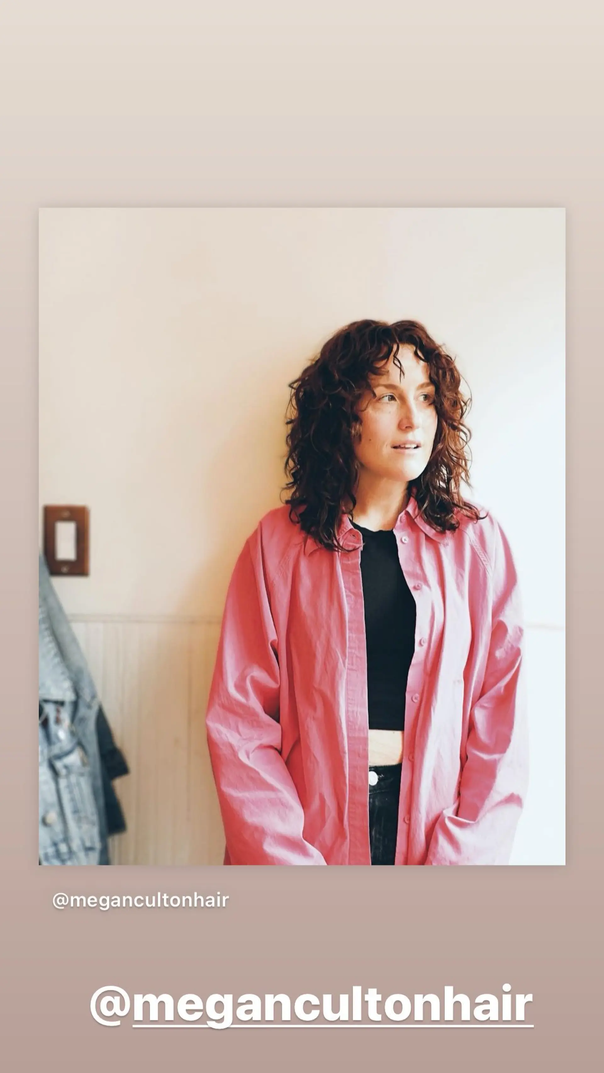 A medium-length shag haircut with curly bangs and lots of layers. 1