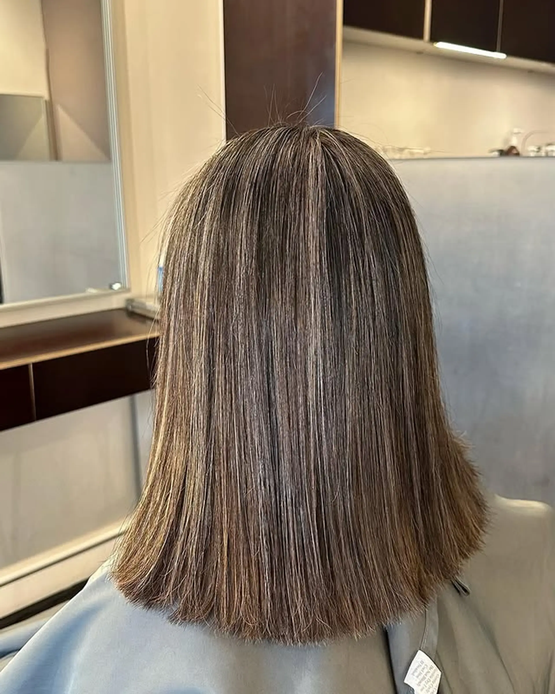 A bronde balayage lob with subtle highlights. 1