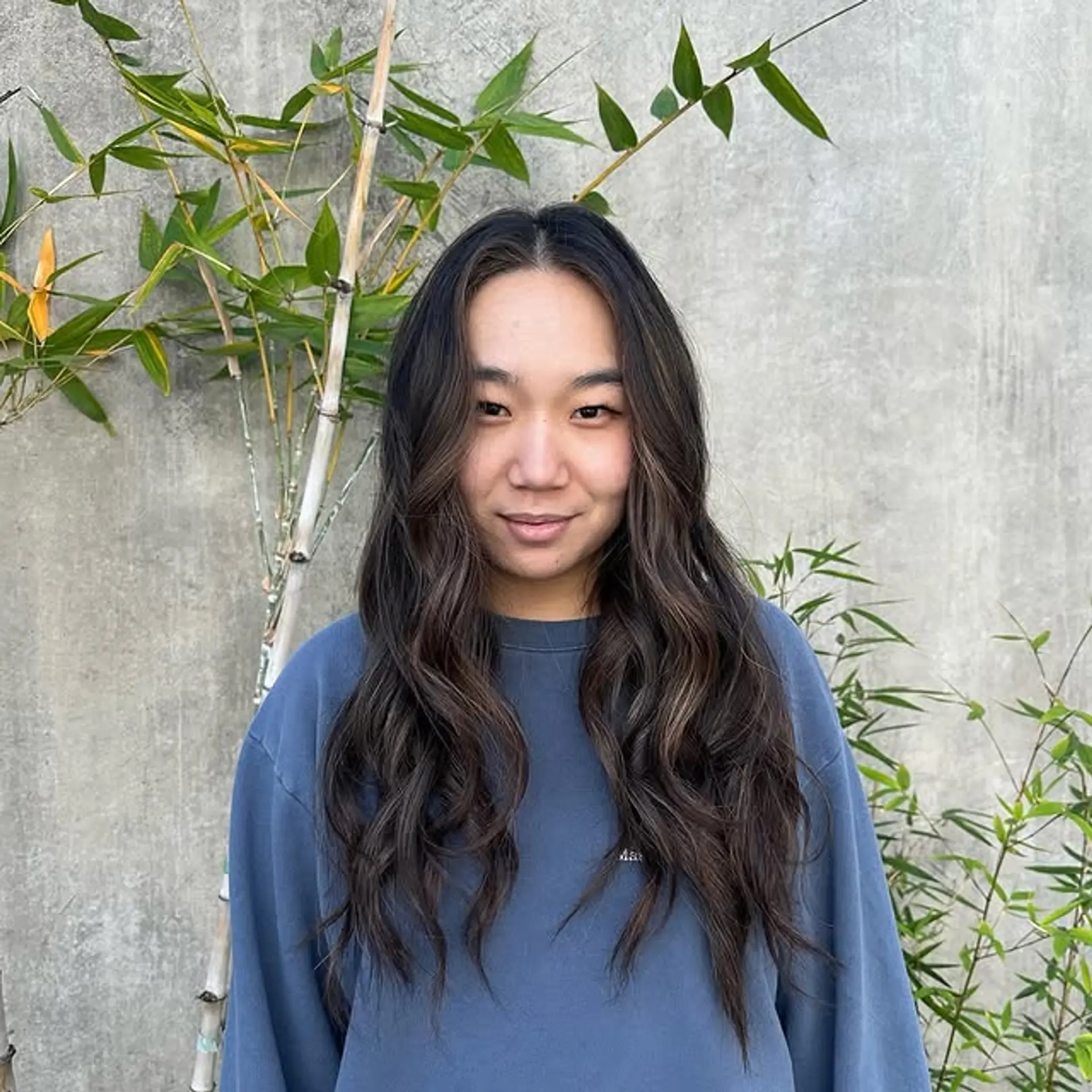 Long wavy hair with a chocolate swirl balayage. 1