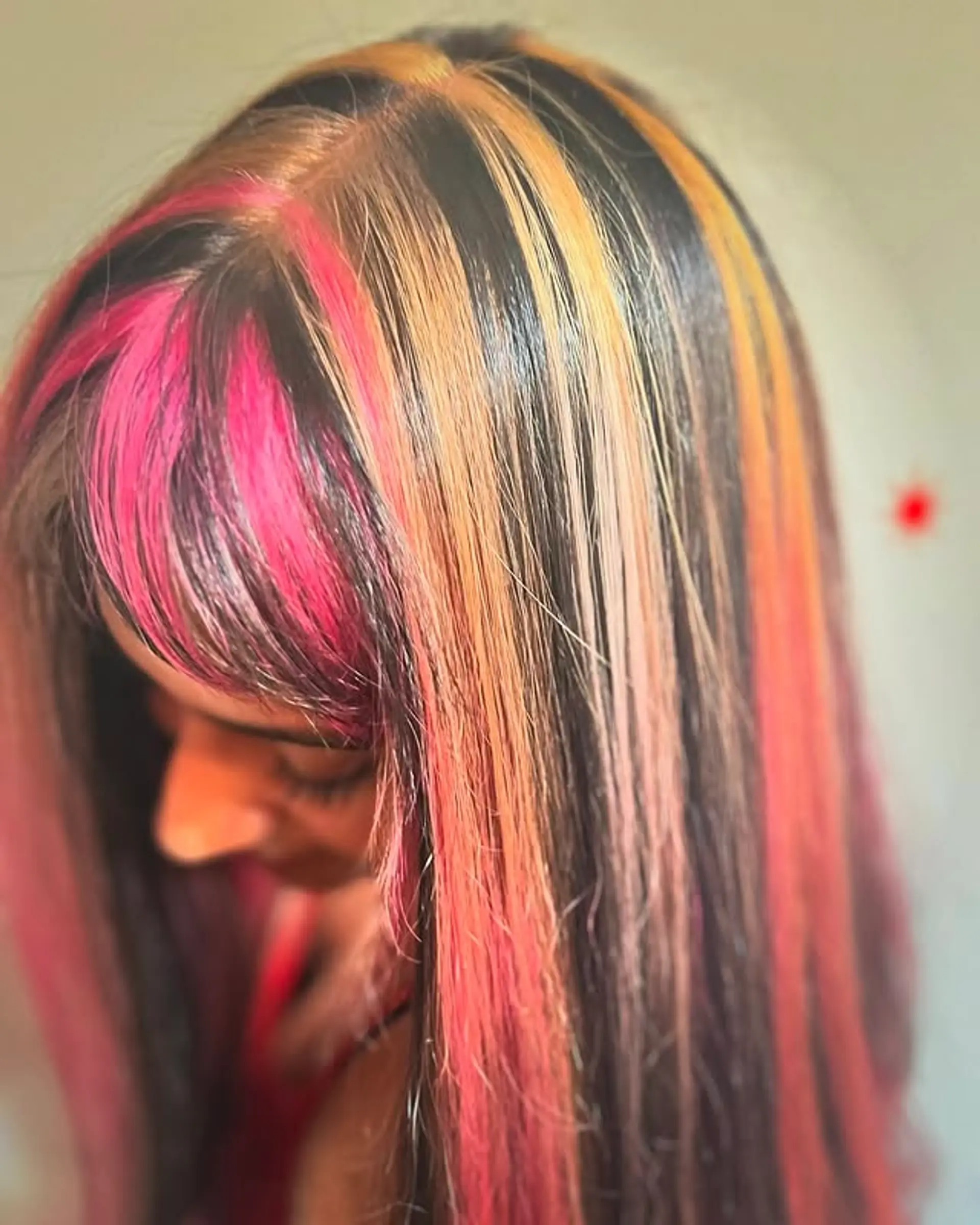 Long, straight hair with colorful streaks and subtle layering. 1