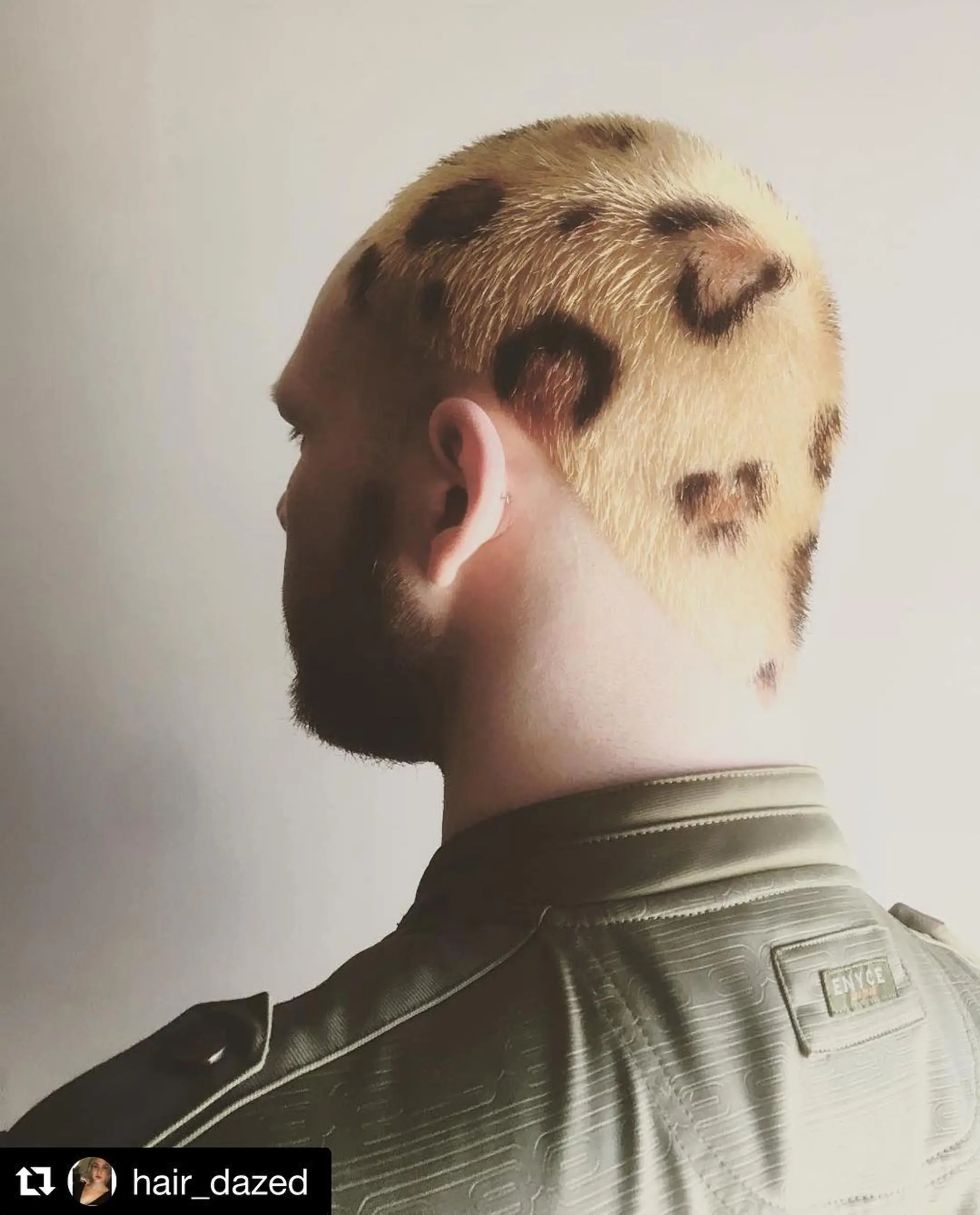 Very short buzz cut with a leopard print design. 1