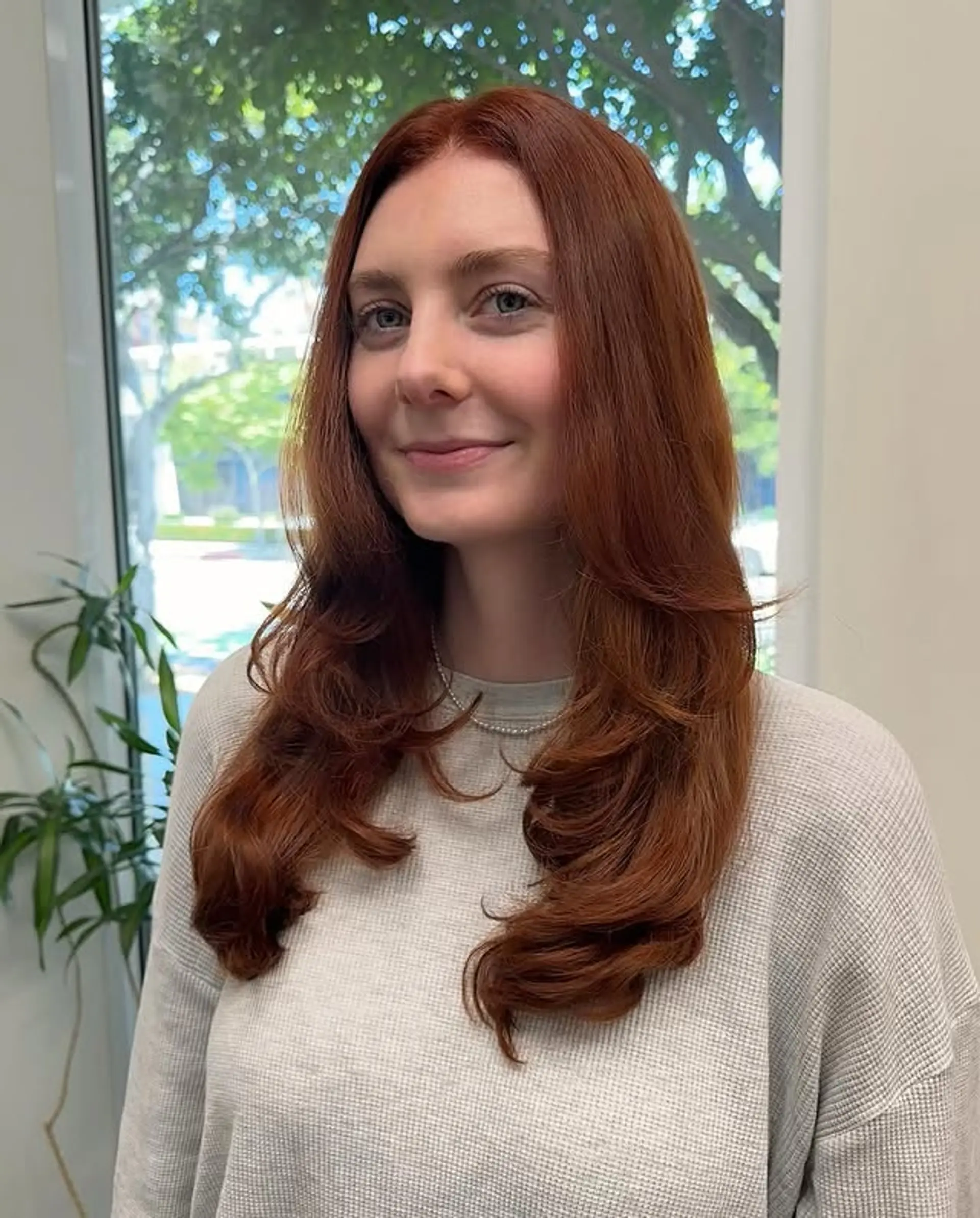 A beautiful copper hair with soft layers and face-framing 1