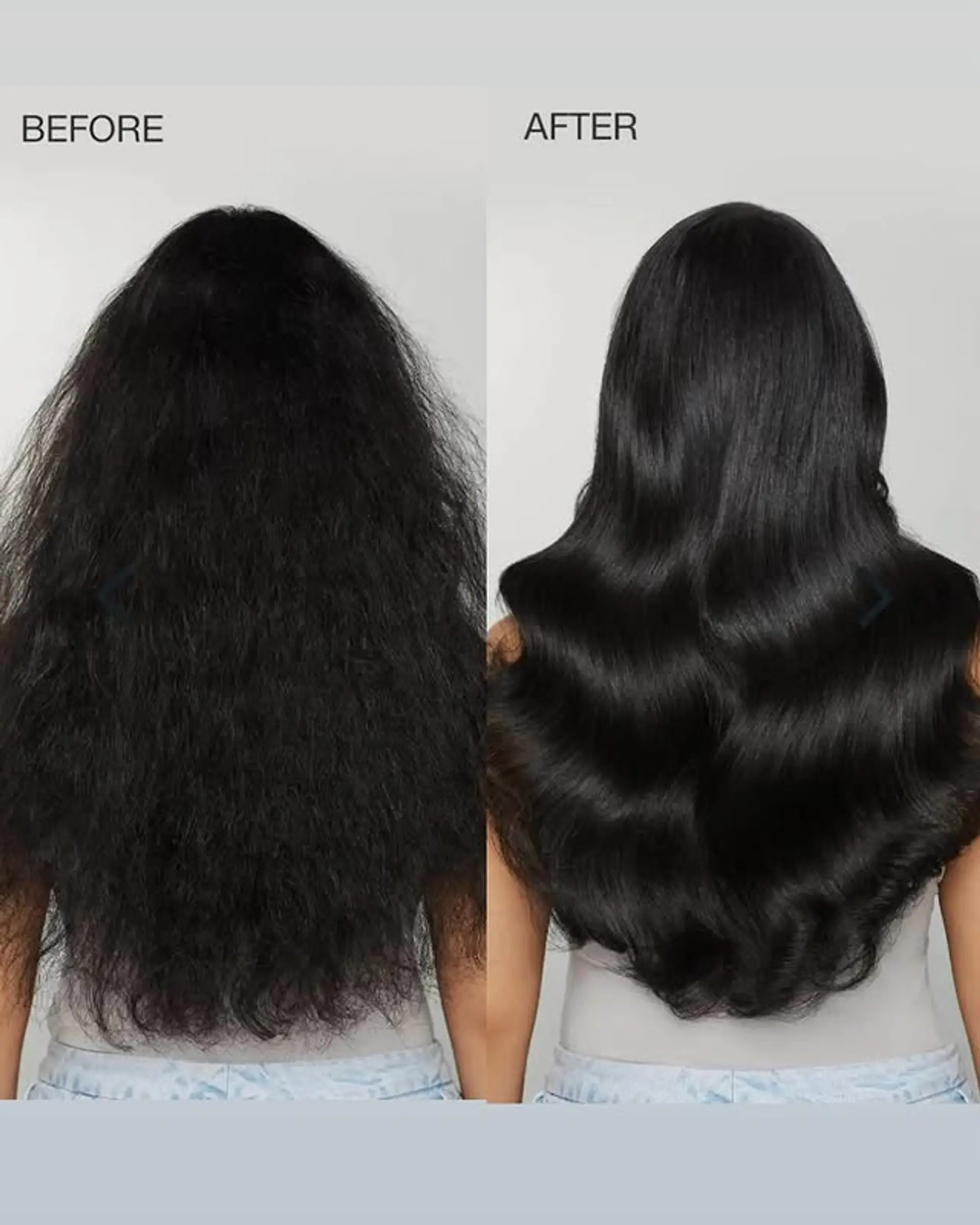 Silky smooth, long black hair styled with soft, voluminous body waves, showcasing a glossy and healthy appearance after a significant texture transformation. 1