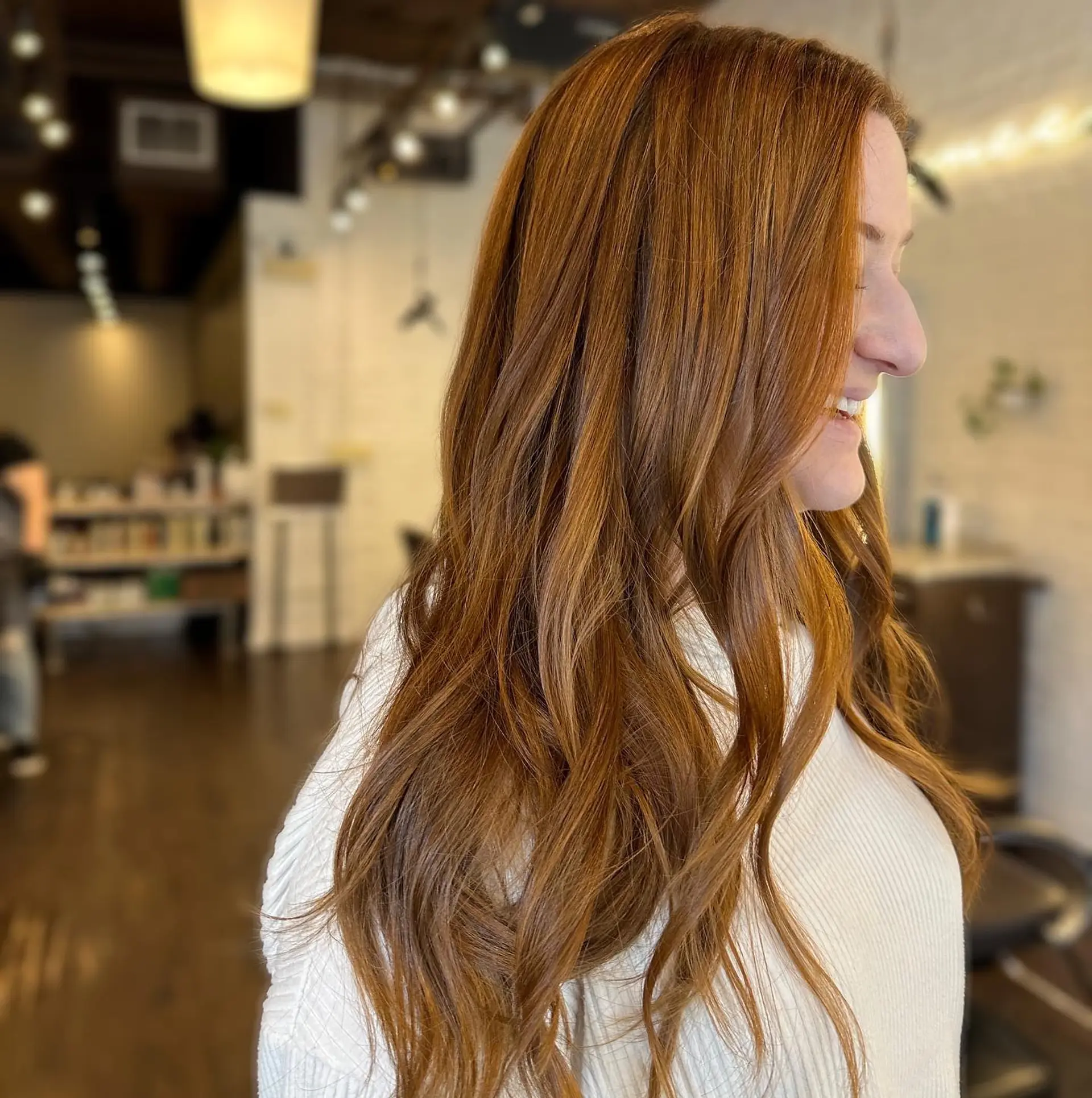 Long, flowing copper hair with soft waves. 1