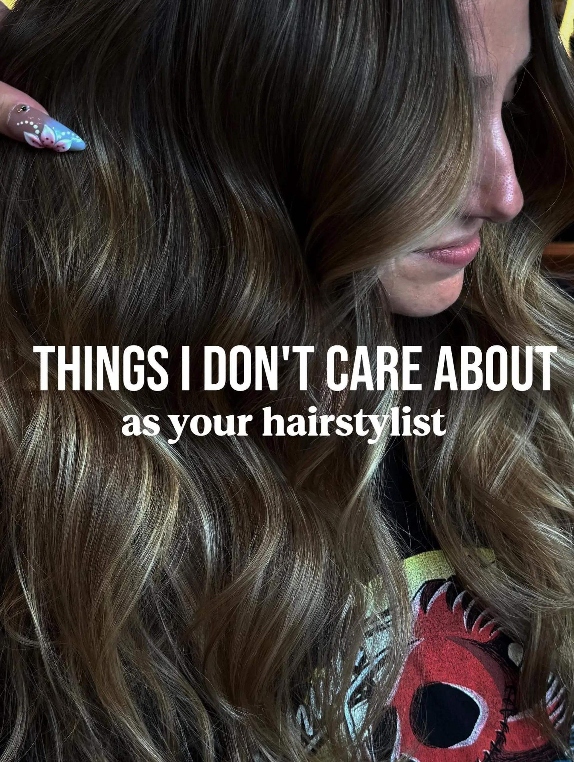 Long dimensional brunette hair styled in loose, textured waves with blended caramel highlights. 1