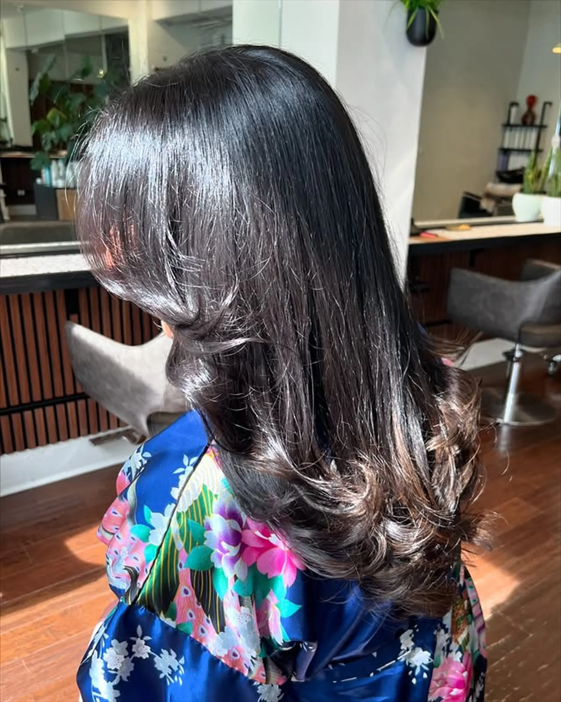 Long layered hair with soft waves and lots of movement. 1