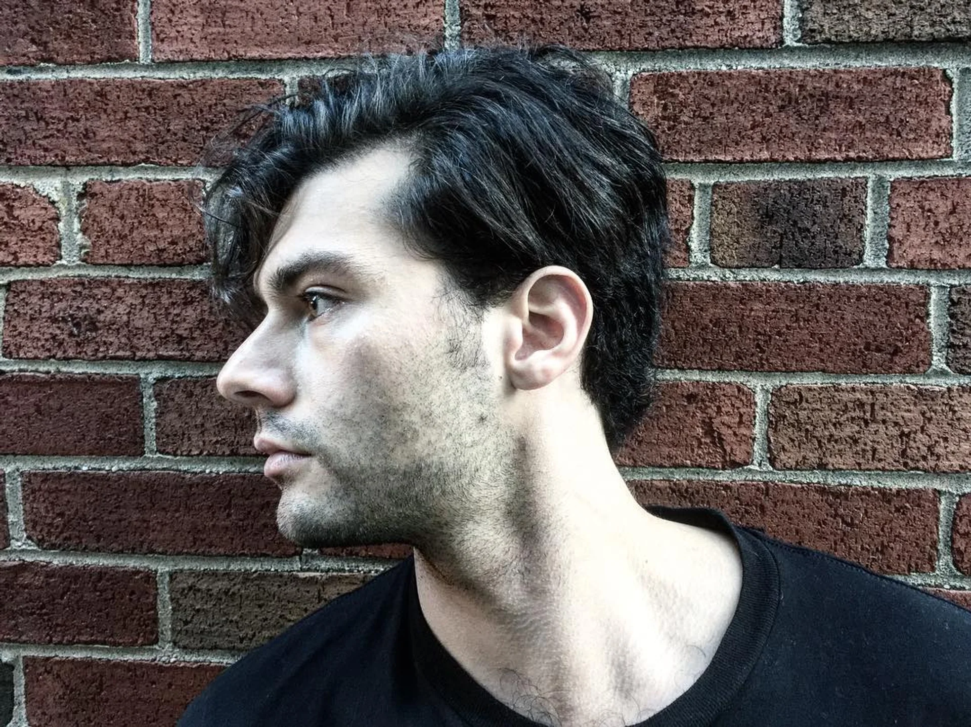 Medium-length curly hair styled in a relaxed bro flow with a naturally tapered neckline - Preview 3