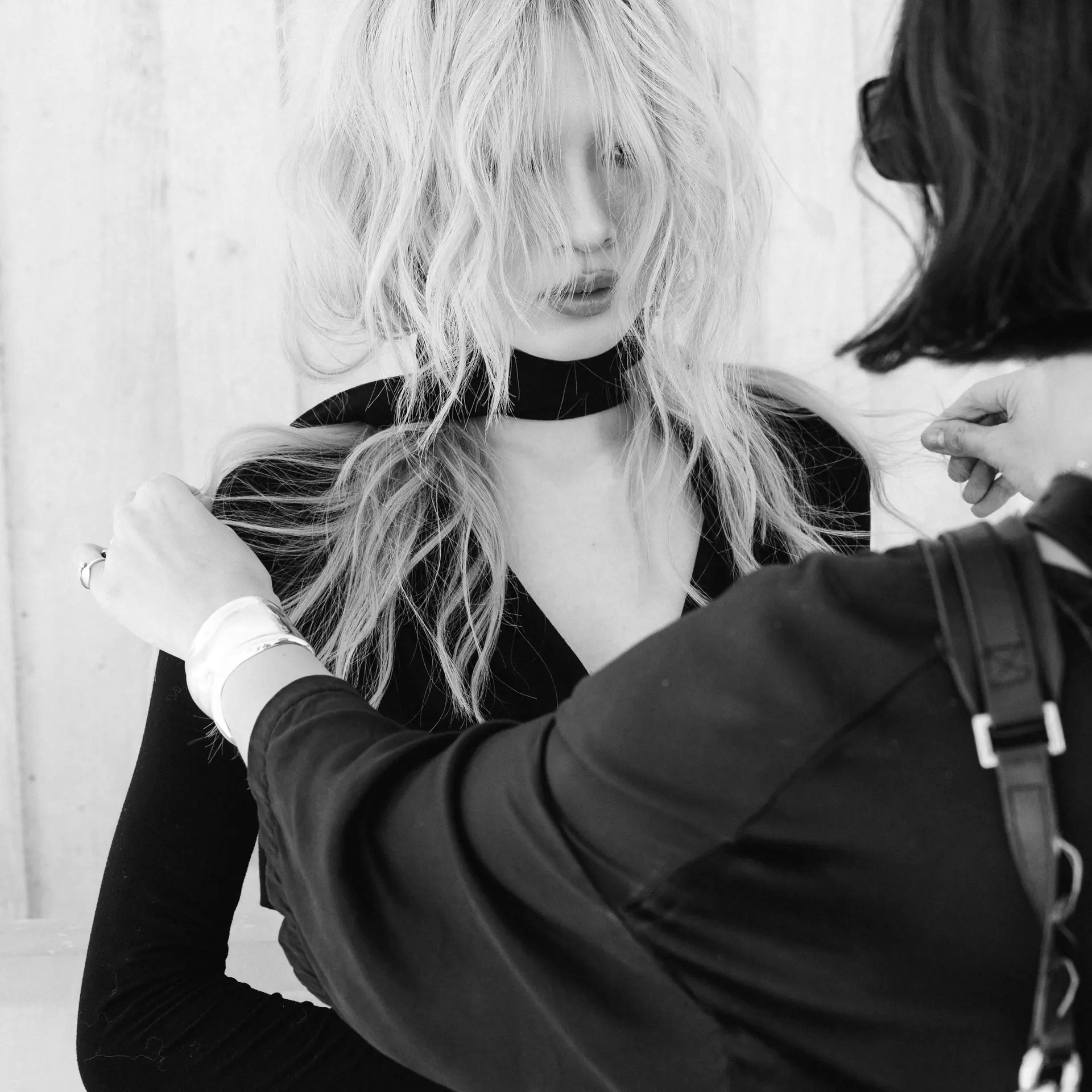 A textured medium-length shag cut with wispy, face-covering fringe and feathered layers. 1