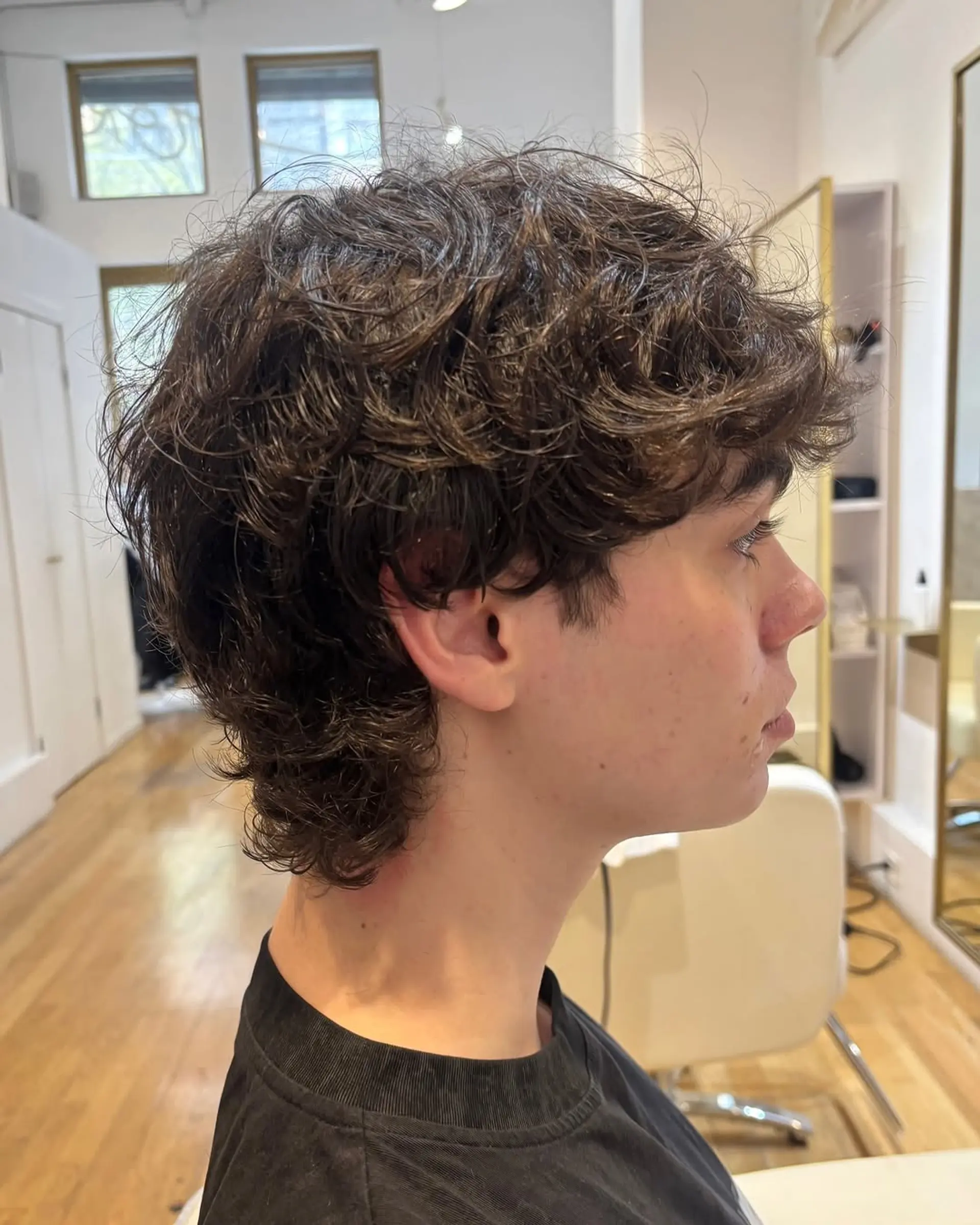 A modern shag haircut with textured curls. 1
