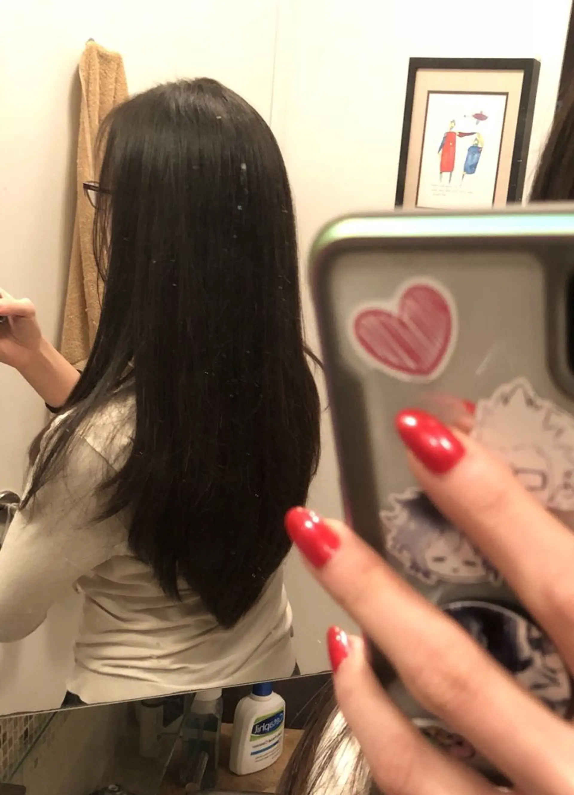 A long, layered V-cut hairstyle. 1