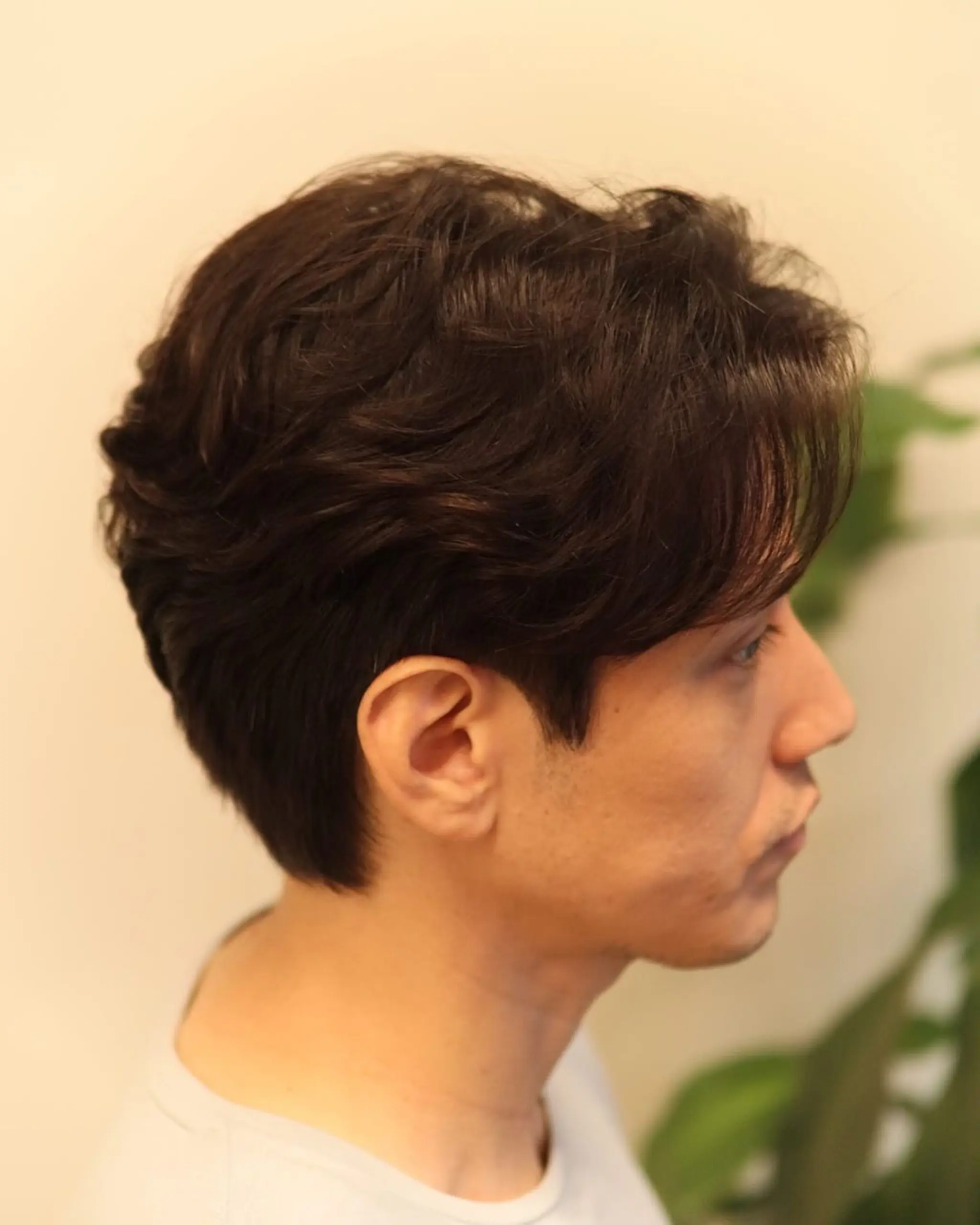 Natural waves with tapered sides and blended longer top for a soft, low maintenance look.