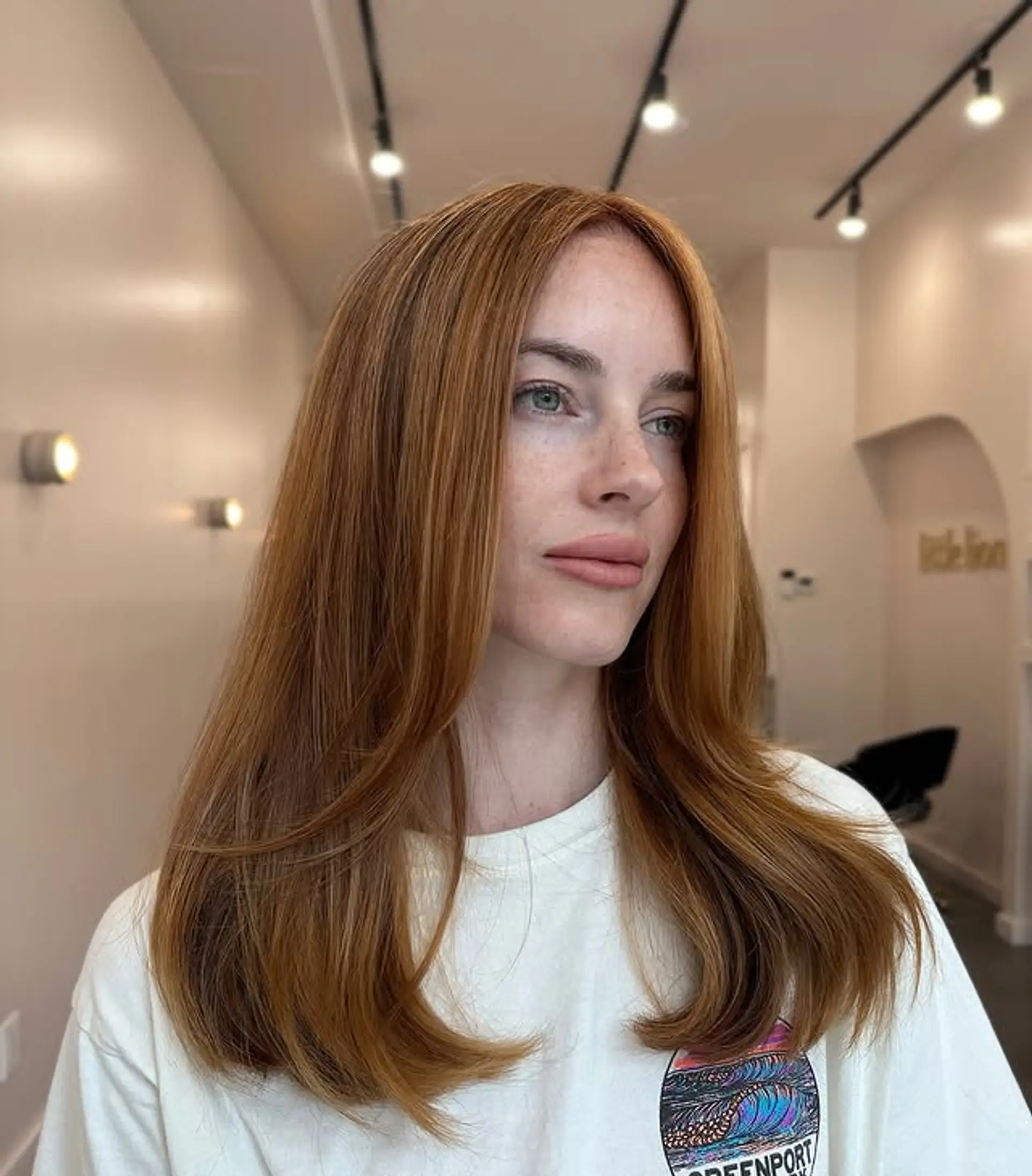 A stylish medium-length layered cut with face-framing layers. 1