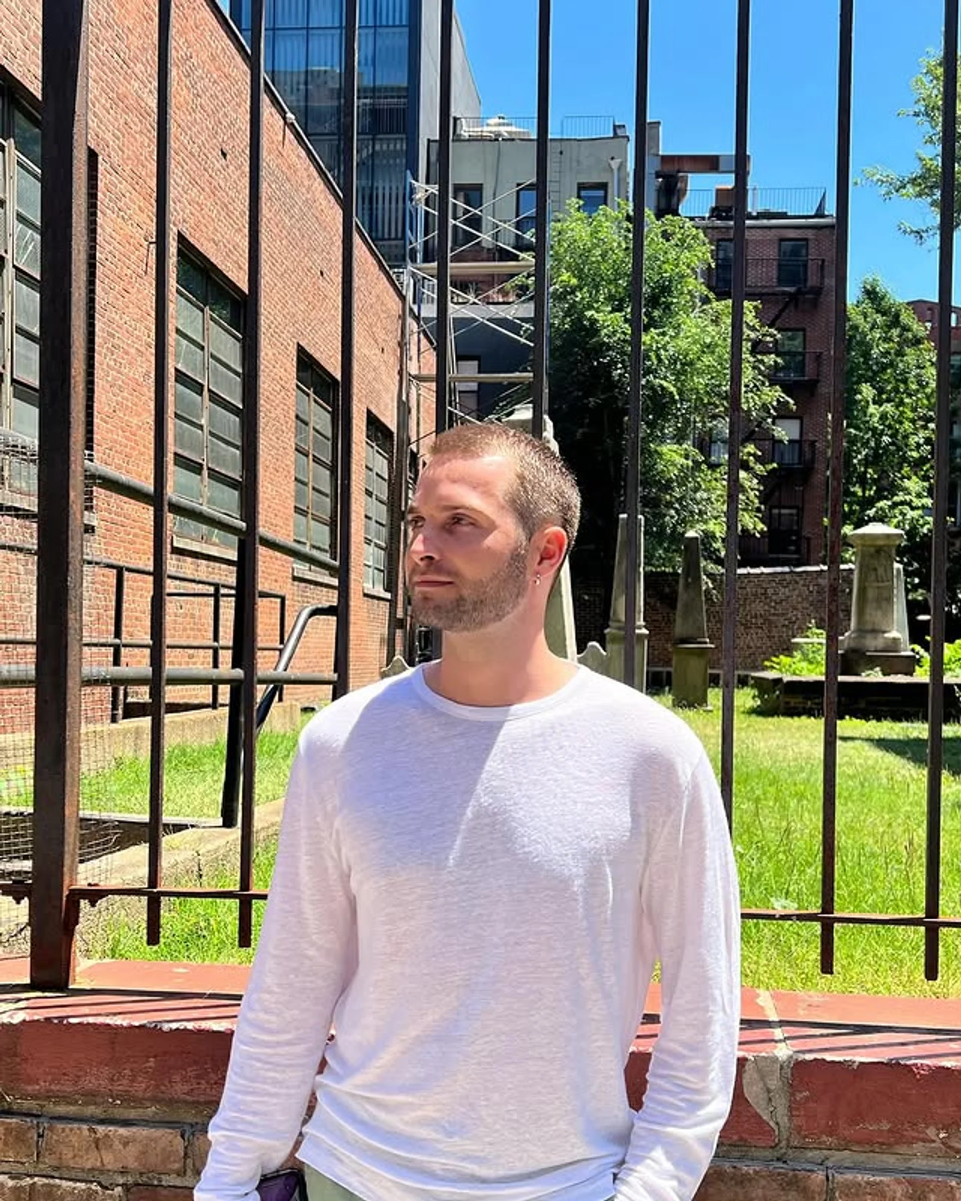 Stylish male with a textured platinum blonde buzz cut, showcasing a modern short hairstyle - Preview 2