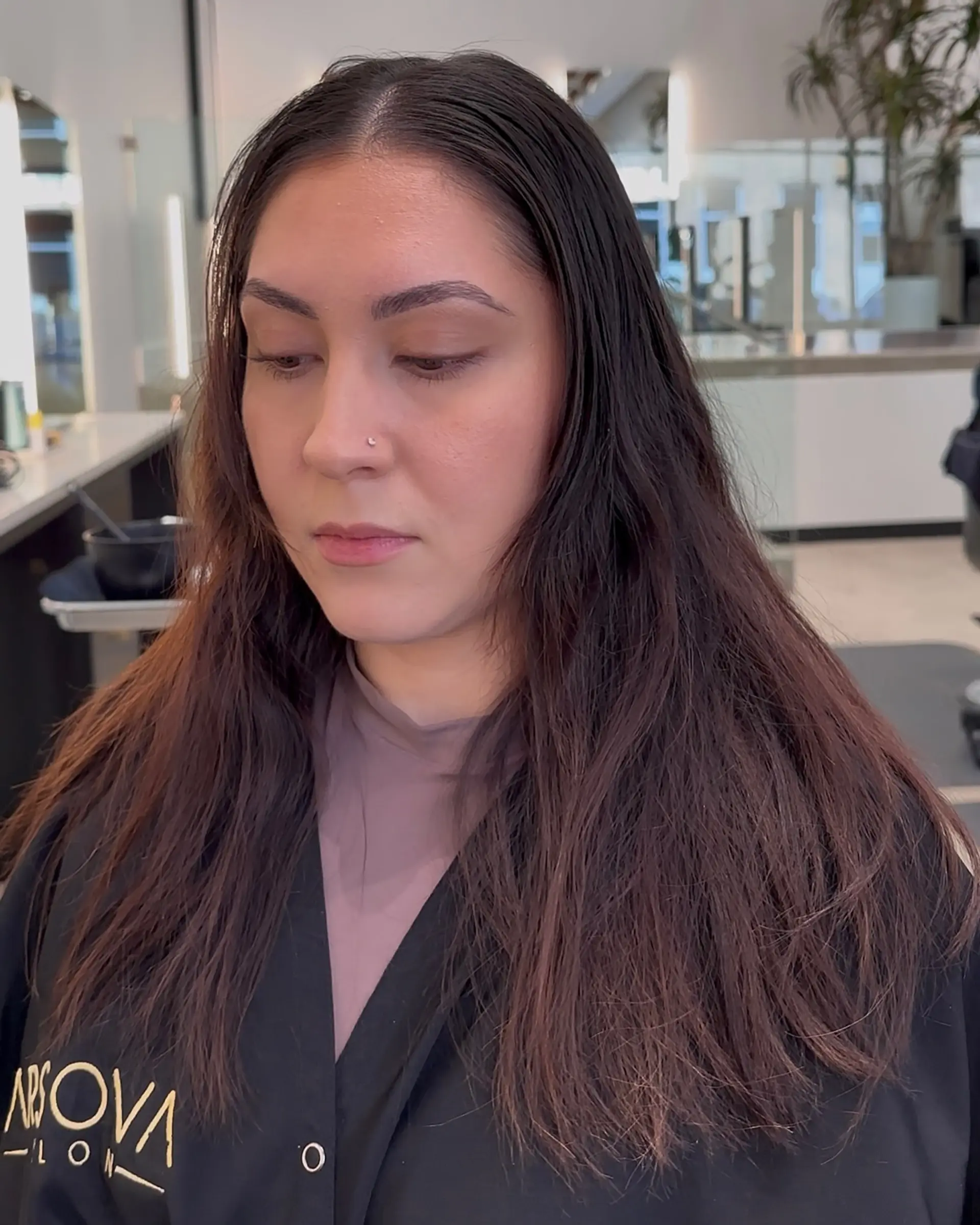 Long, wavy hair with a balayage and subtle brown highlights. 3