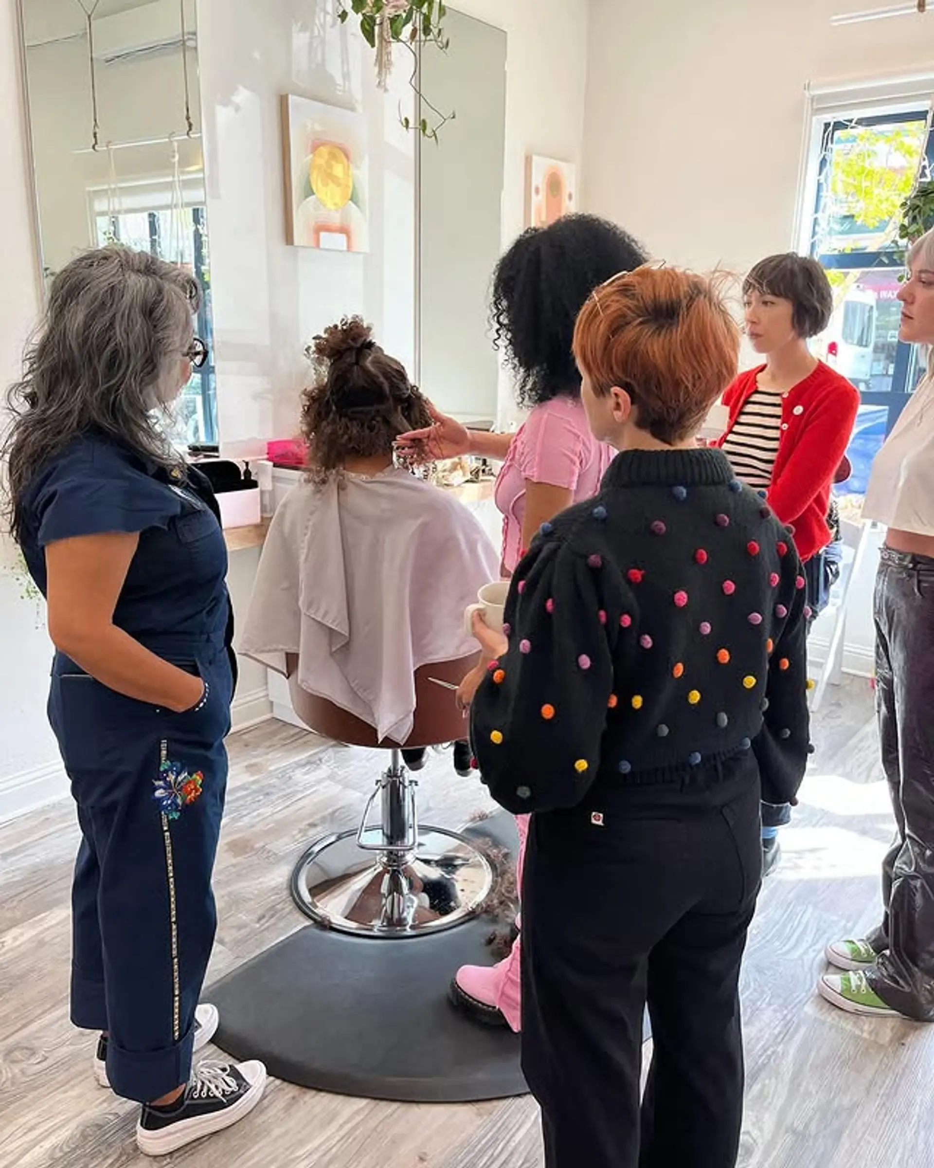 A short, textured pixie cut with choppy layers for added texture and movement. 1