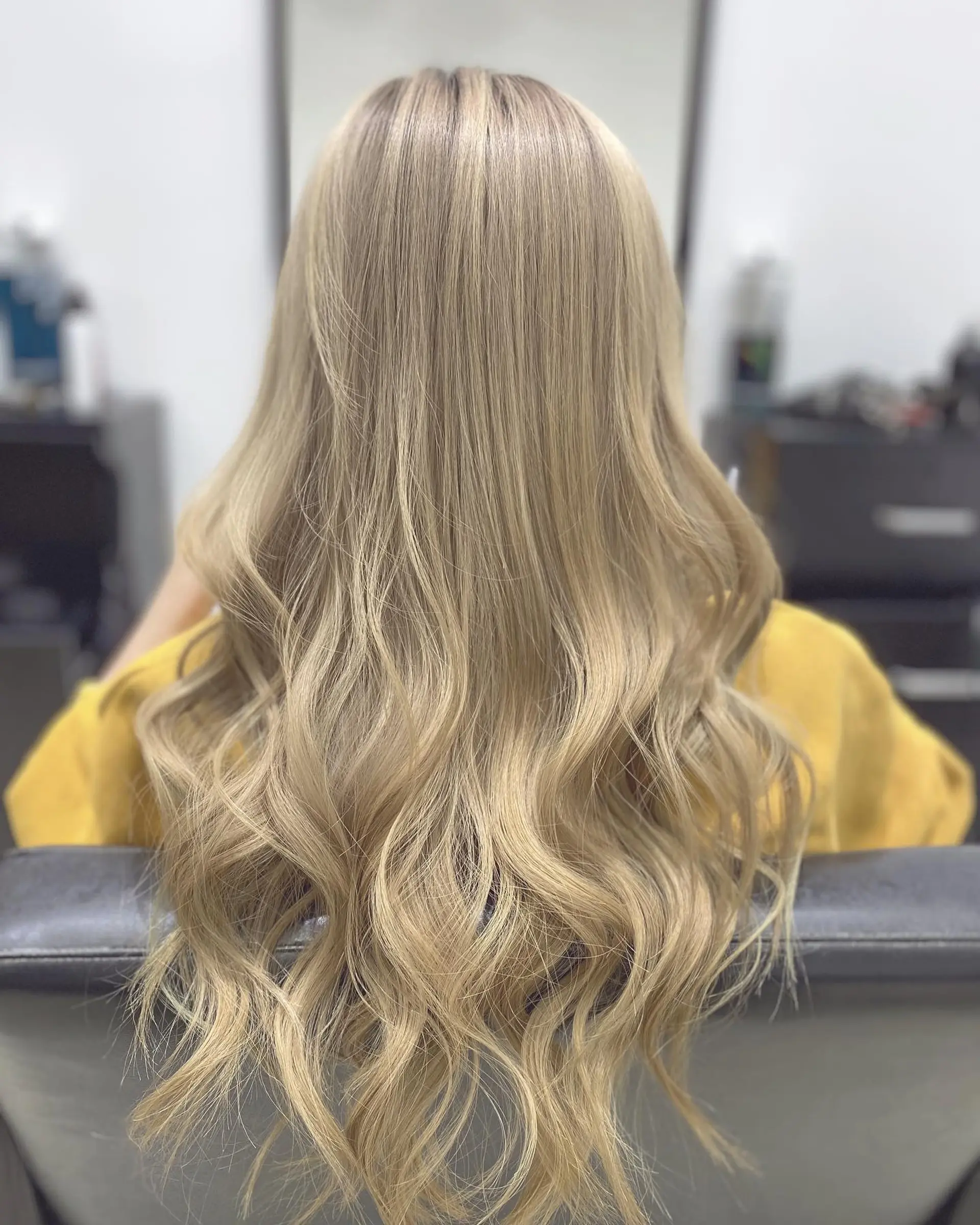 Long, soft blonde waves with a beachy feel. 1