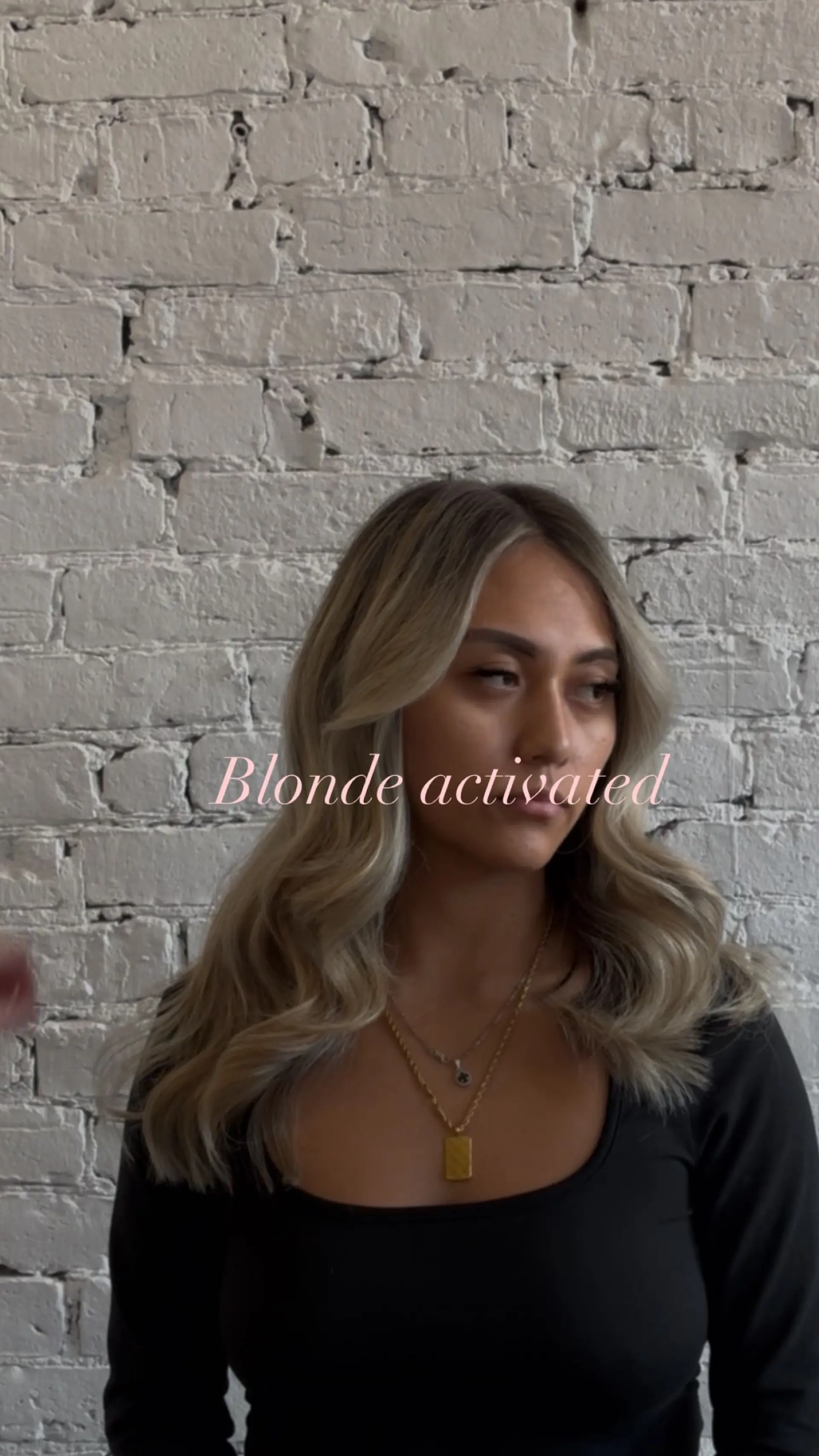 Soft dimensional blonde highlights styled into voluminous, smooth blowout waves with face-framing layers. 1