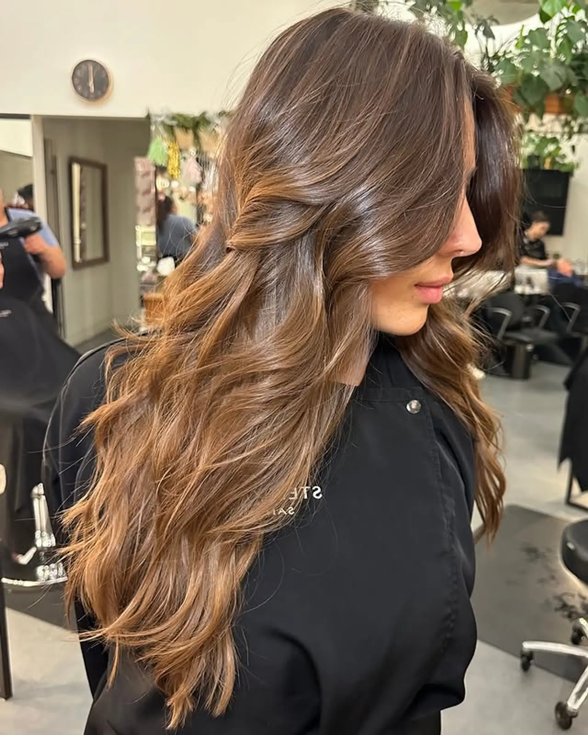 Long layered waves with caramel balayage. 1