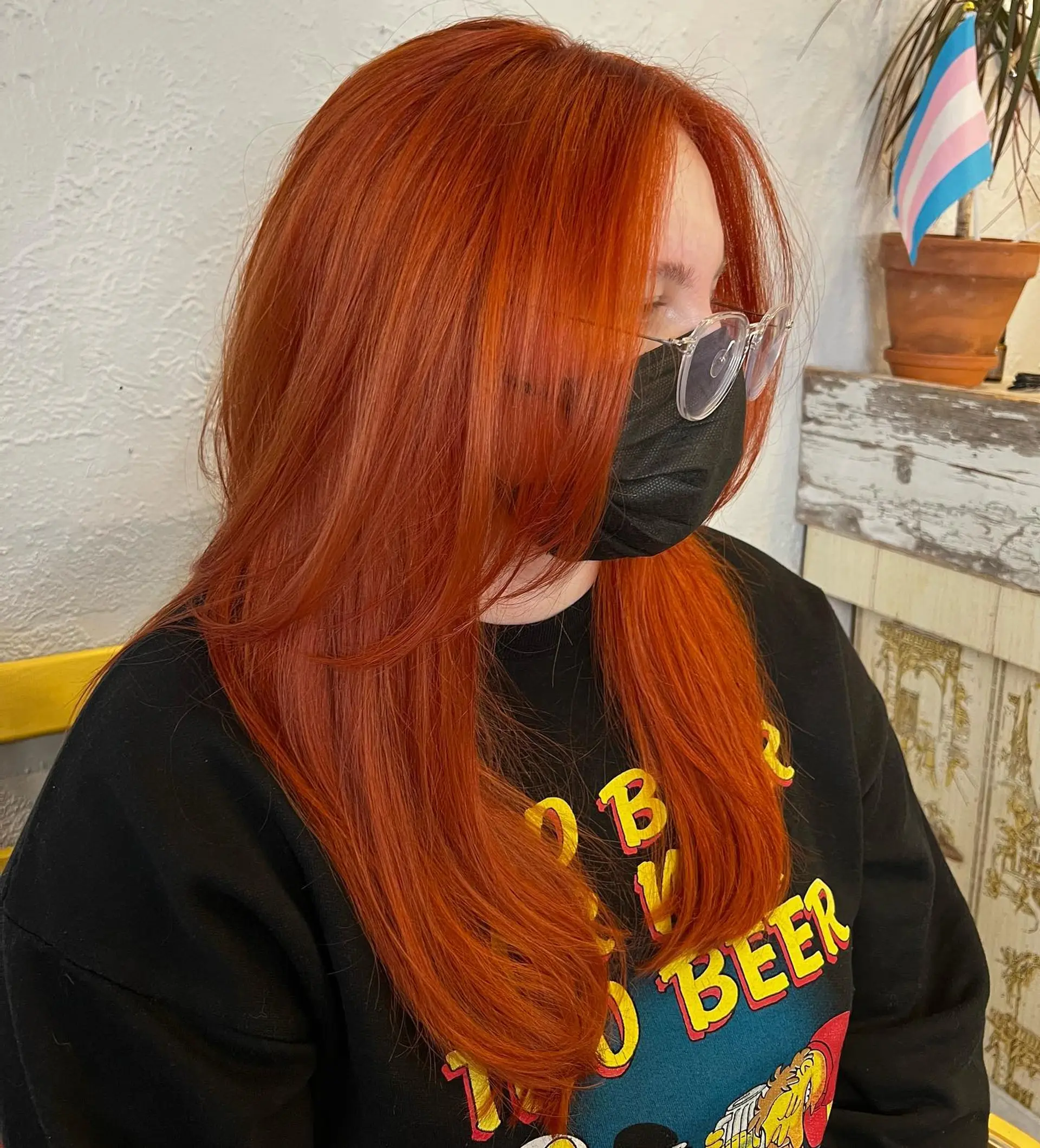 Long, straight hairstyle with face-framing layers and a center part. 1