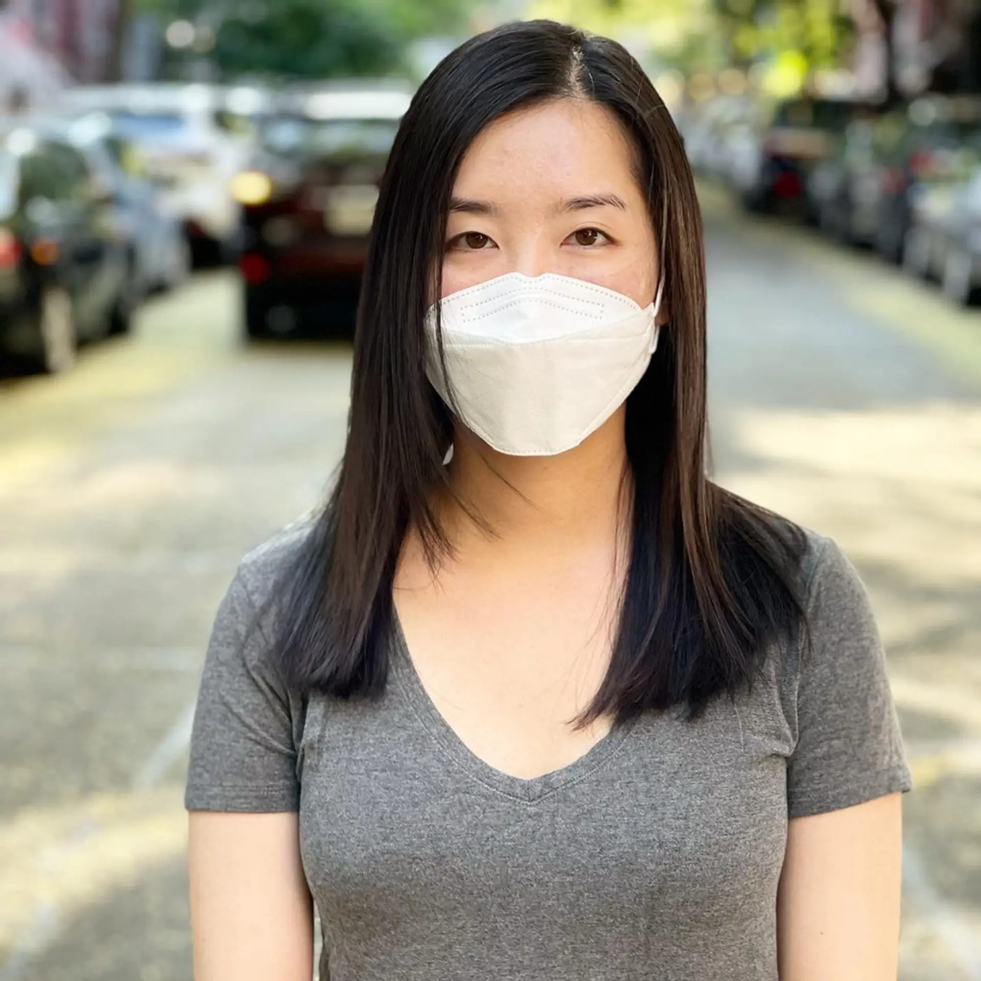 A medium-length, straight hairstyle with long layers for added movement and a smooth, silky finish. 1