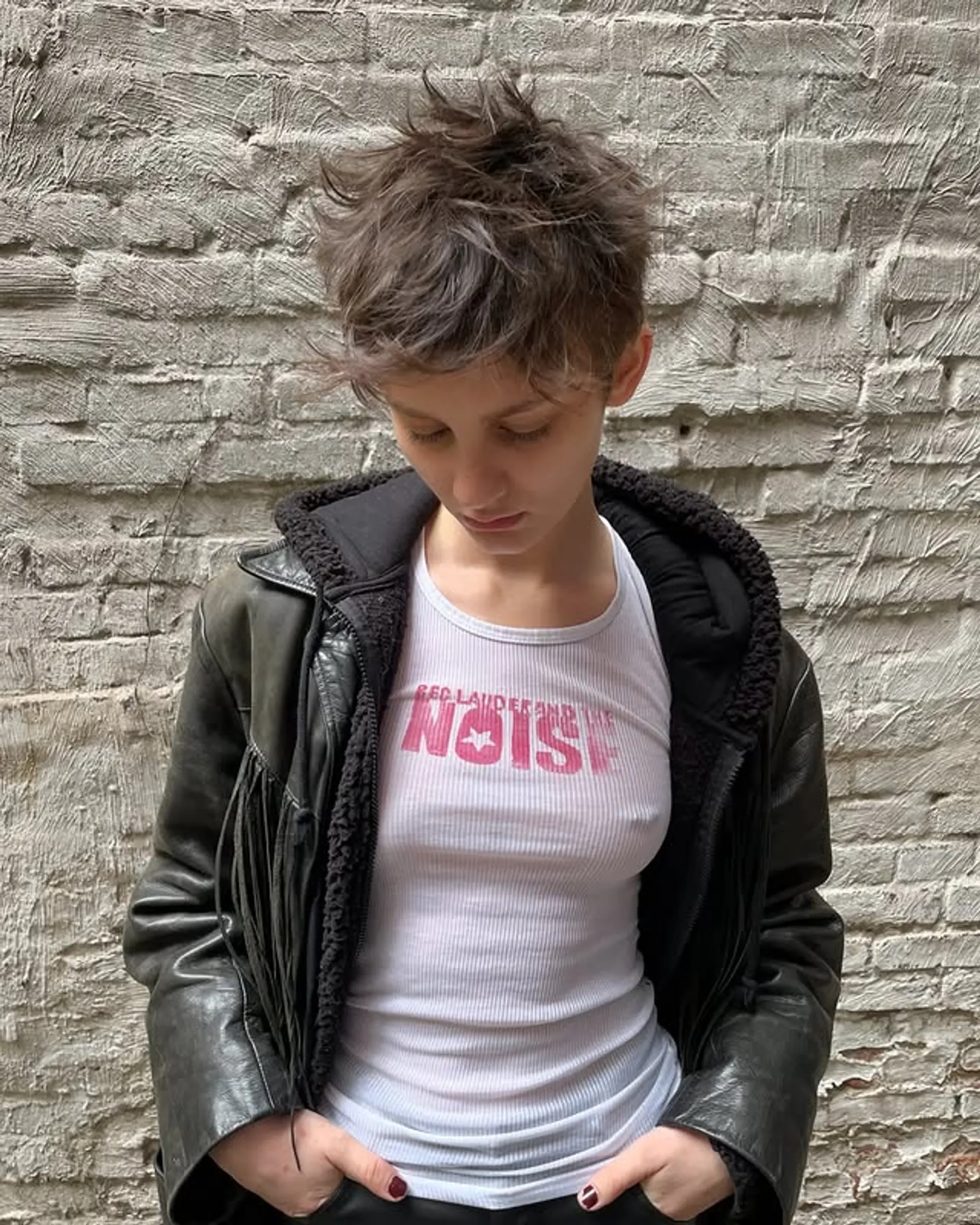 A short, textured pixie cut with choppy layers for an edgy and modern style. 1