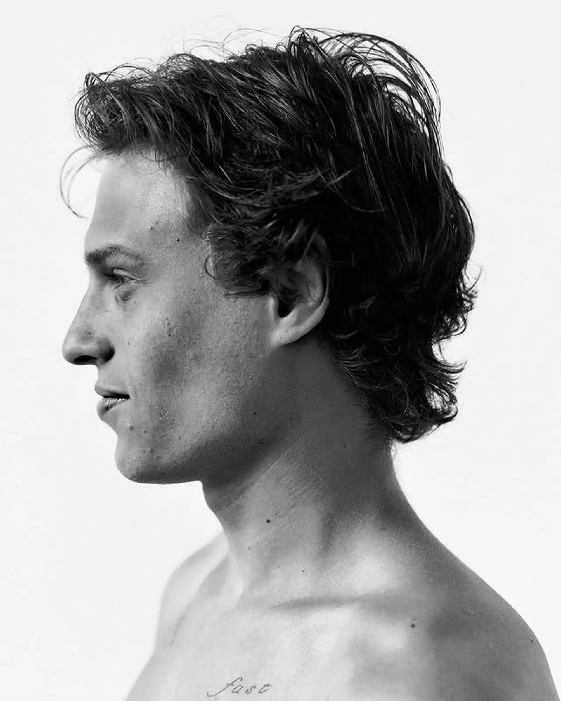 A textured, wavy style with medium length and a natural, undone look. 1