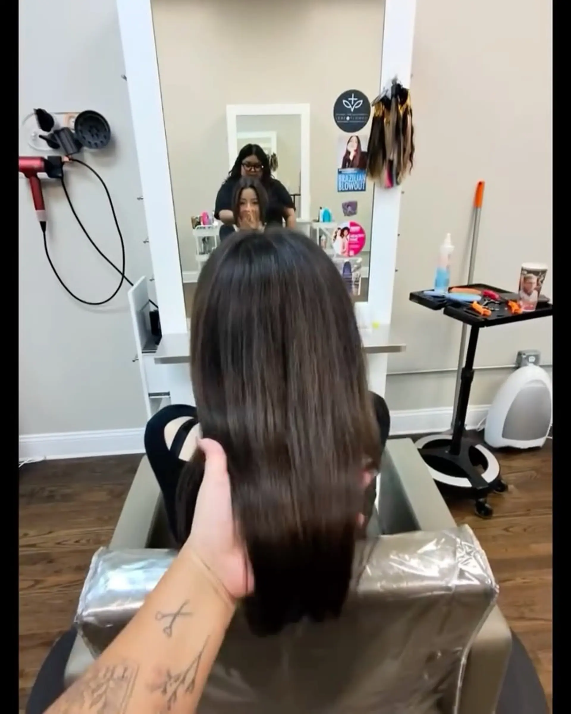 Smooth and glossy long straight dark brown hair styled with sleek shine. 1