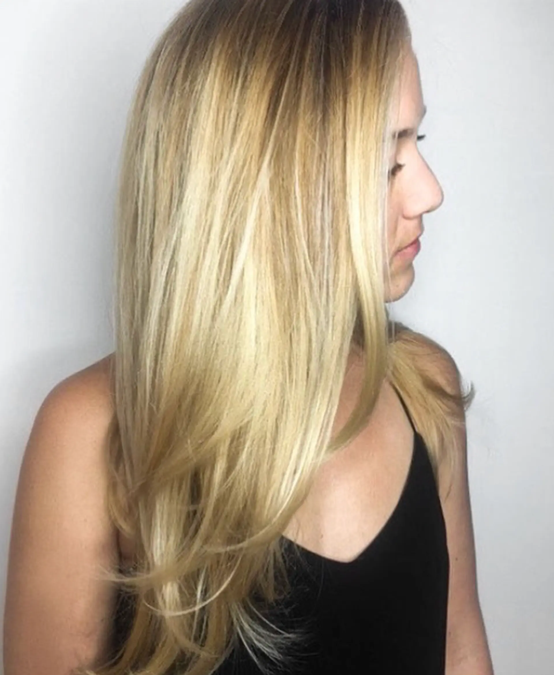 Long layered hairstyle with a blended balayage. 1