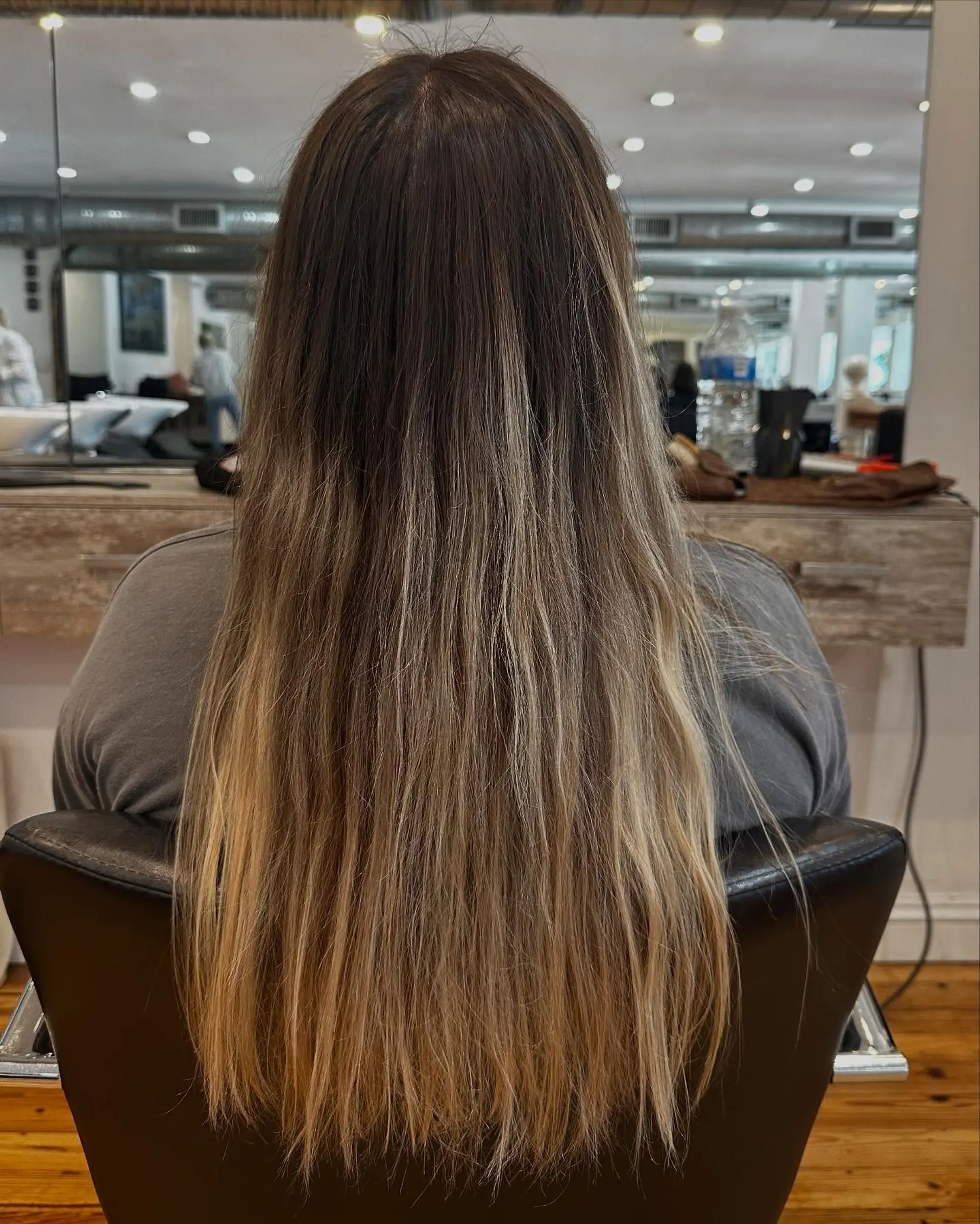 Long wavy hair with a blonde balayage. 3