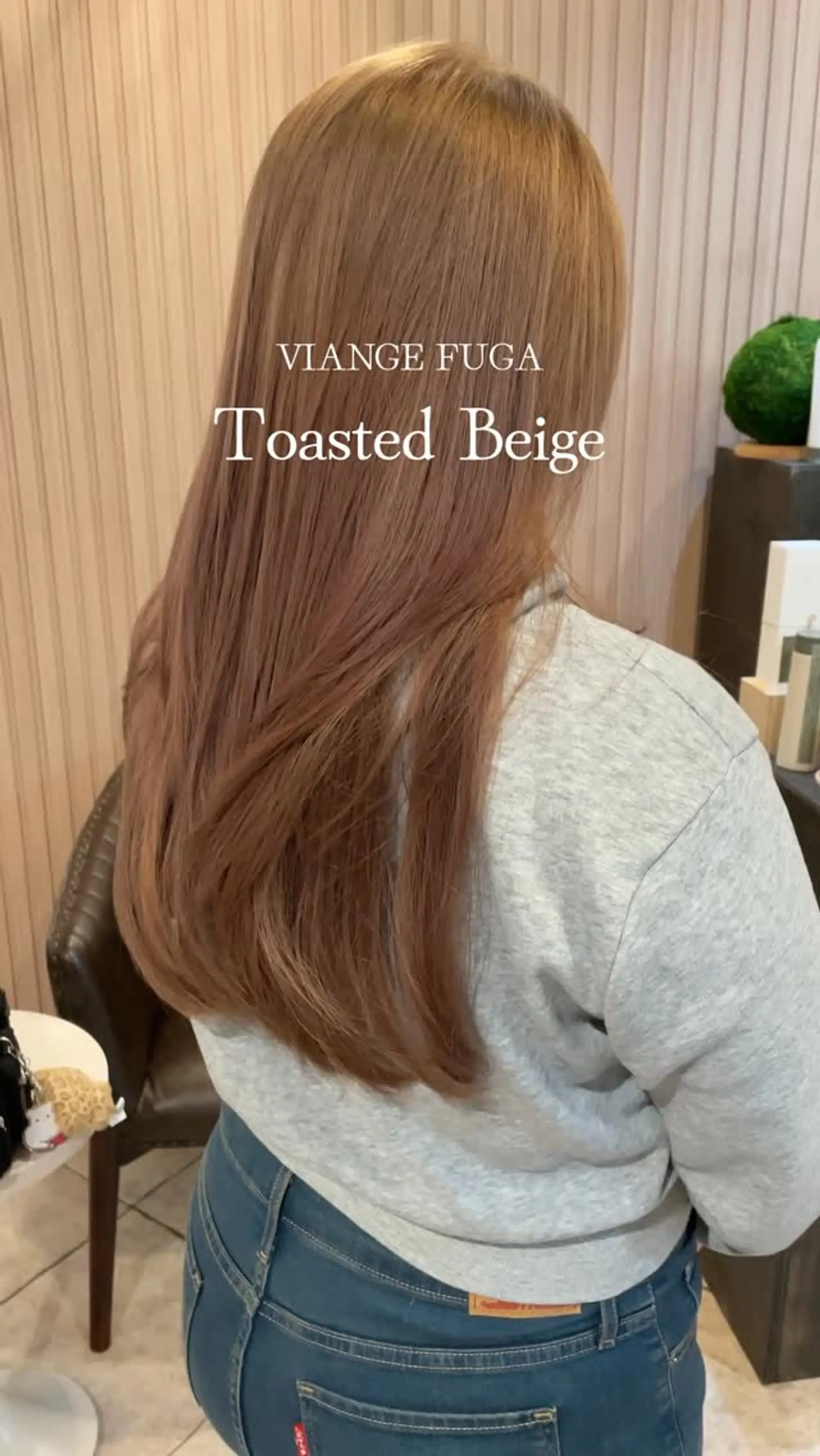 Long, silky hair styled straight with soft layering and an elegant toasted beige color finish. 1