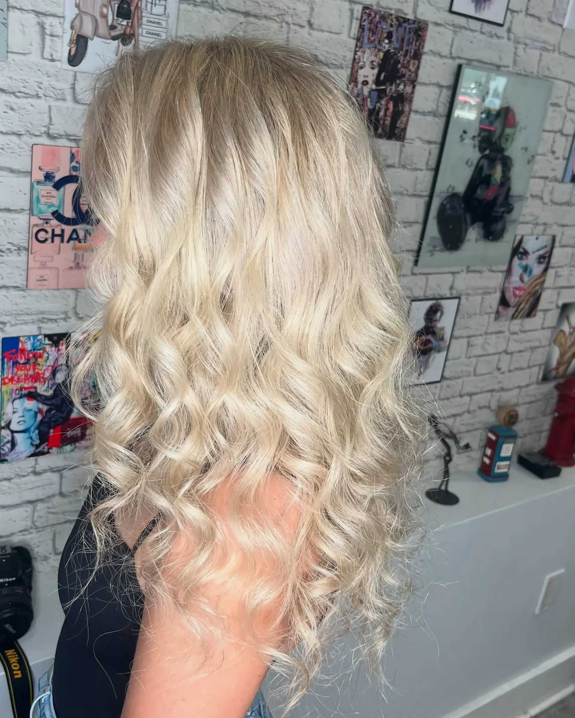 A long, wavy hairstyle featuring beautiful beach waves. The style is loose and relaxed, perfect for a casual yet chic look. 2