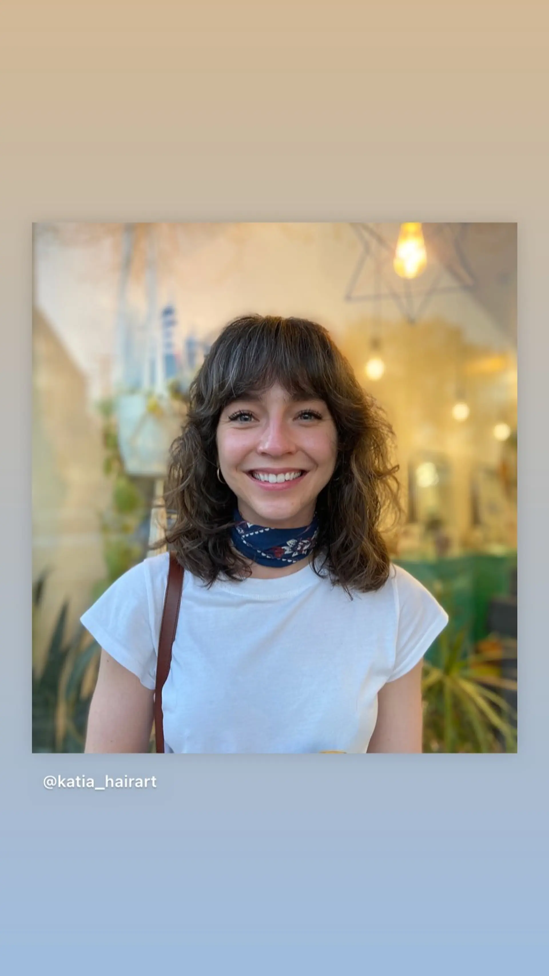 A medium-length shag haircut with layered texture and face-framing curtain bangs. 1