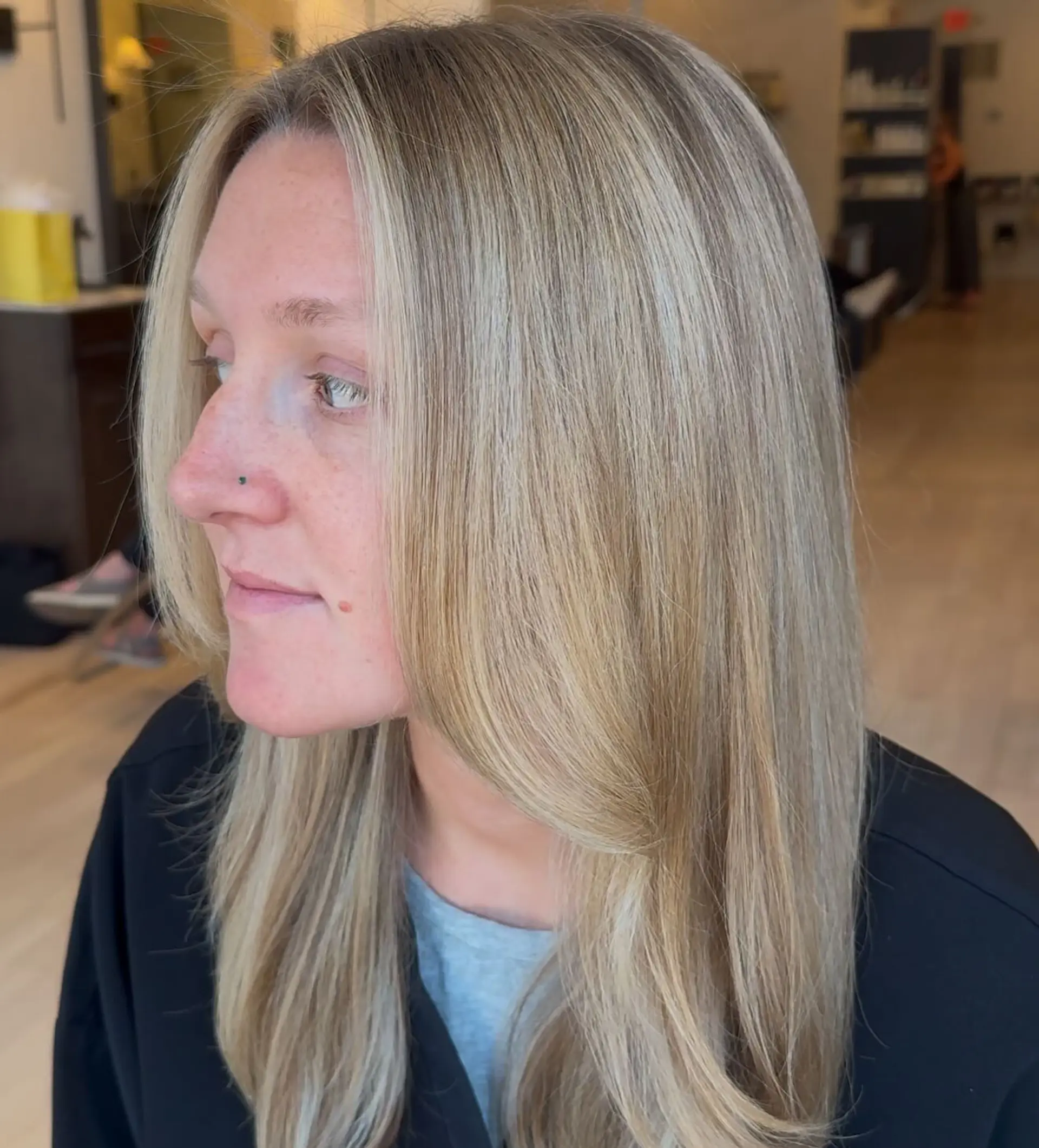 Long straight blonde hair with multi-dimensional highlights and soft face-framing curtain layers. 1