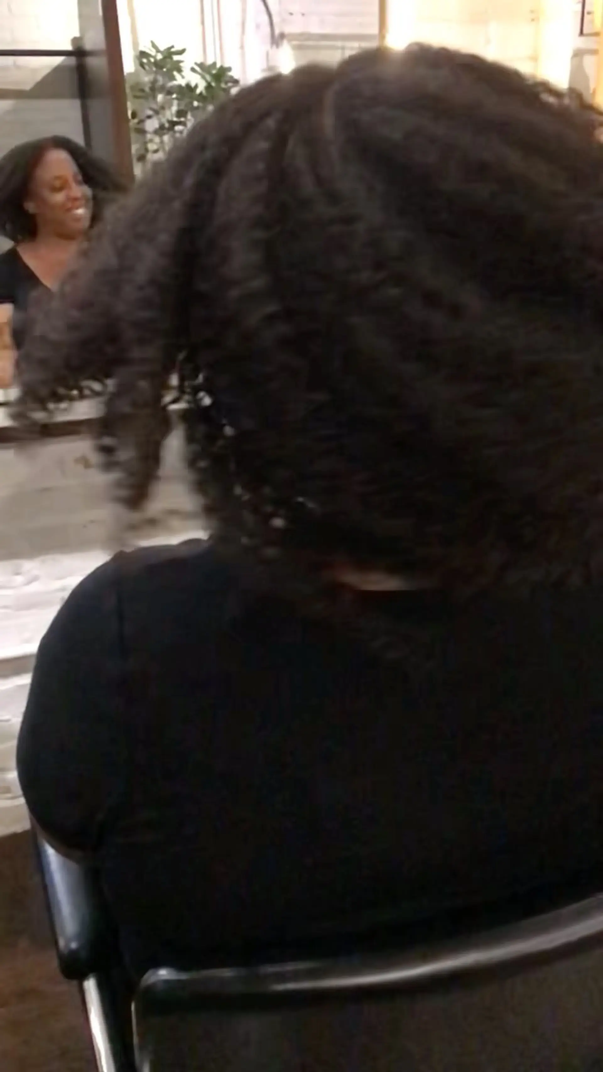Medium-length defined natural curls styled with a wash and go treatment. 1