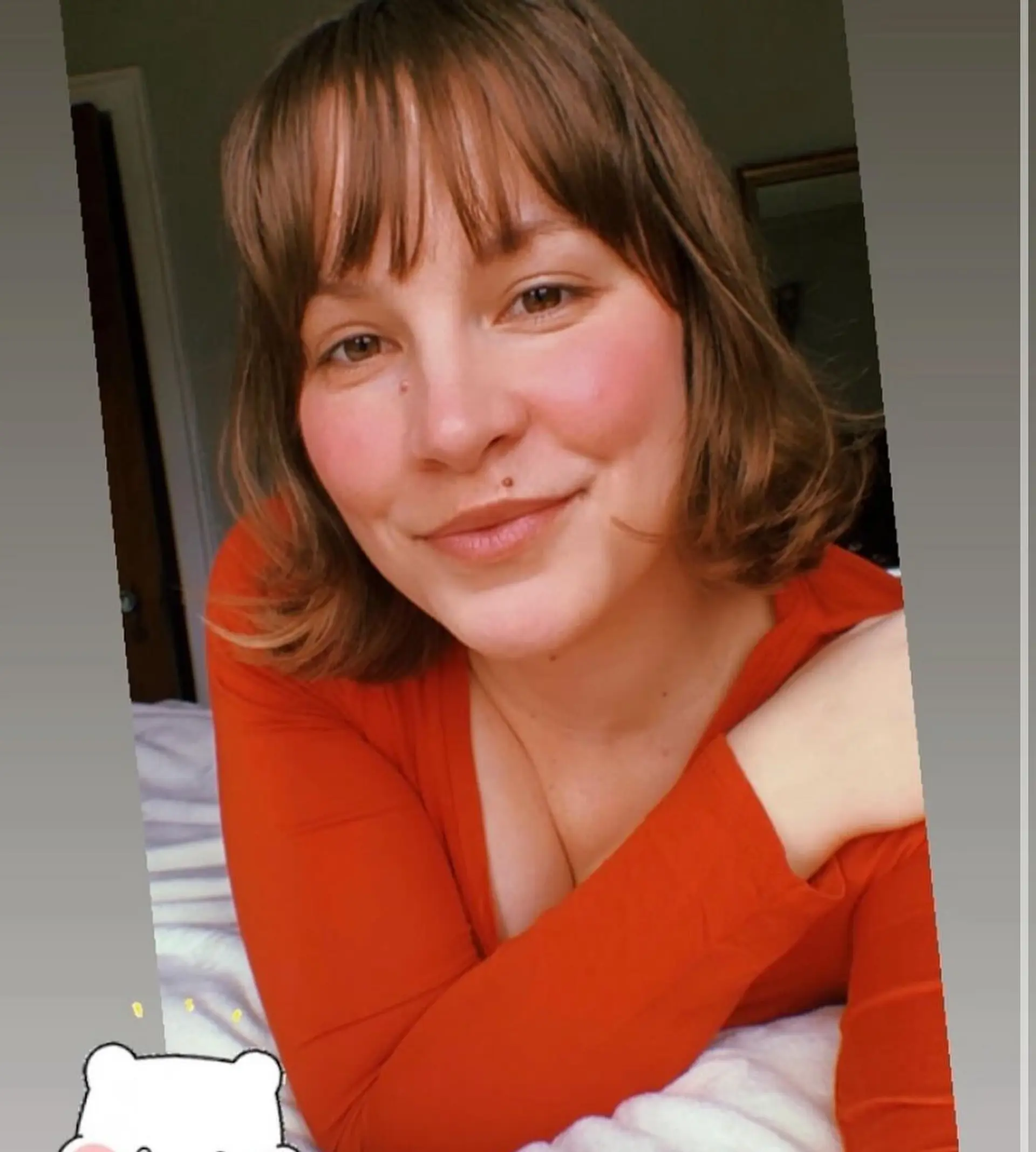 A shaggy lob with choppy layers and face-framing bangs. 1