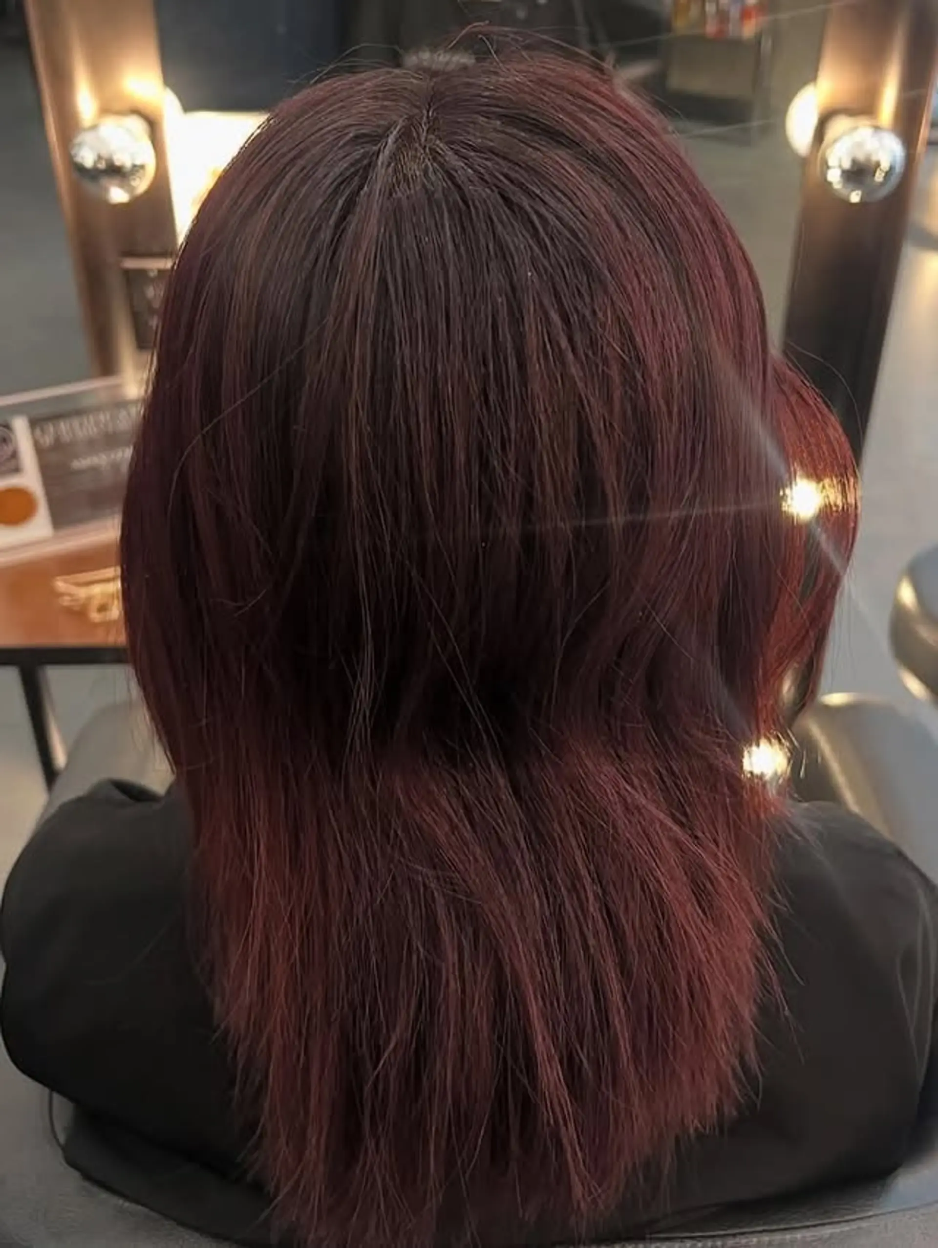 A trendy straight lob with a rich red velvet color. 1