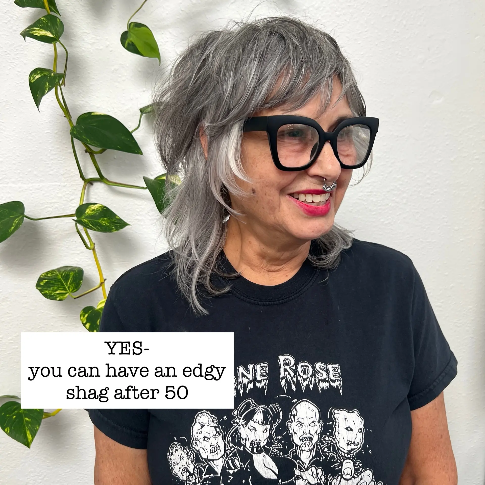 A textured grey shag haircut featuring piecey fringe bangs and soft face-framing layers. 1