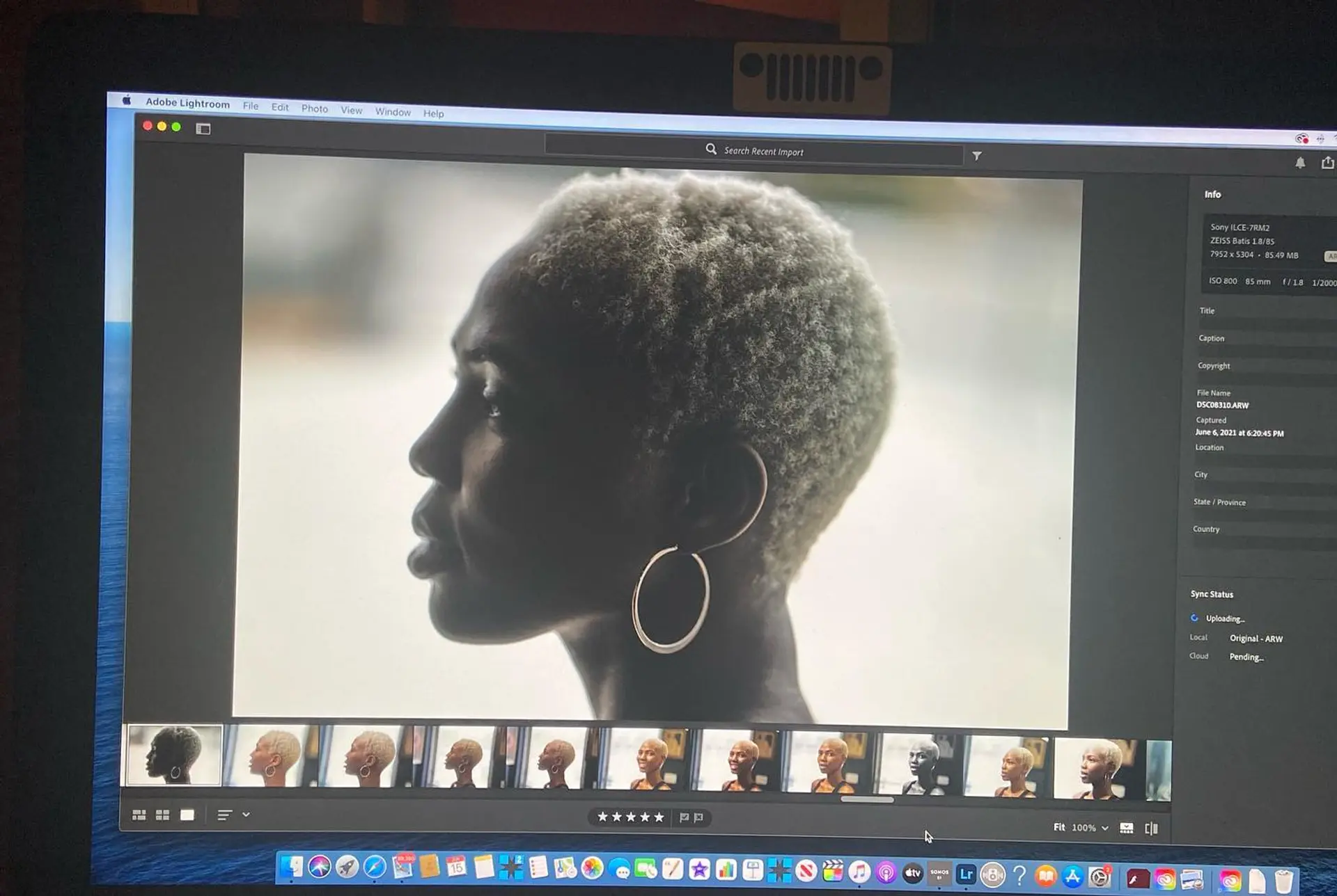 A very short buzz cut dyed in a platinum blonde. 2