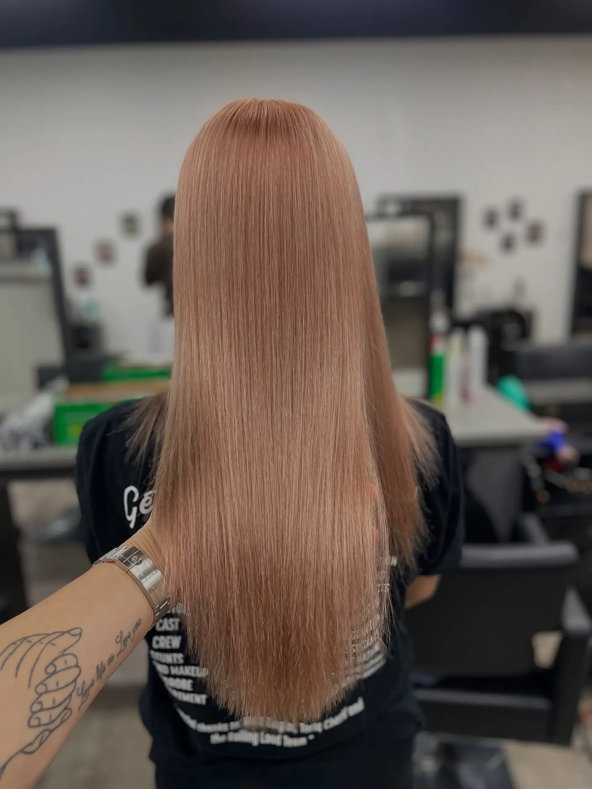 Long, straight hair in a rose gold color. 1
