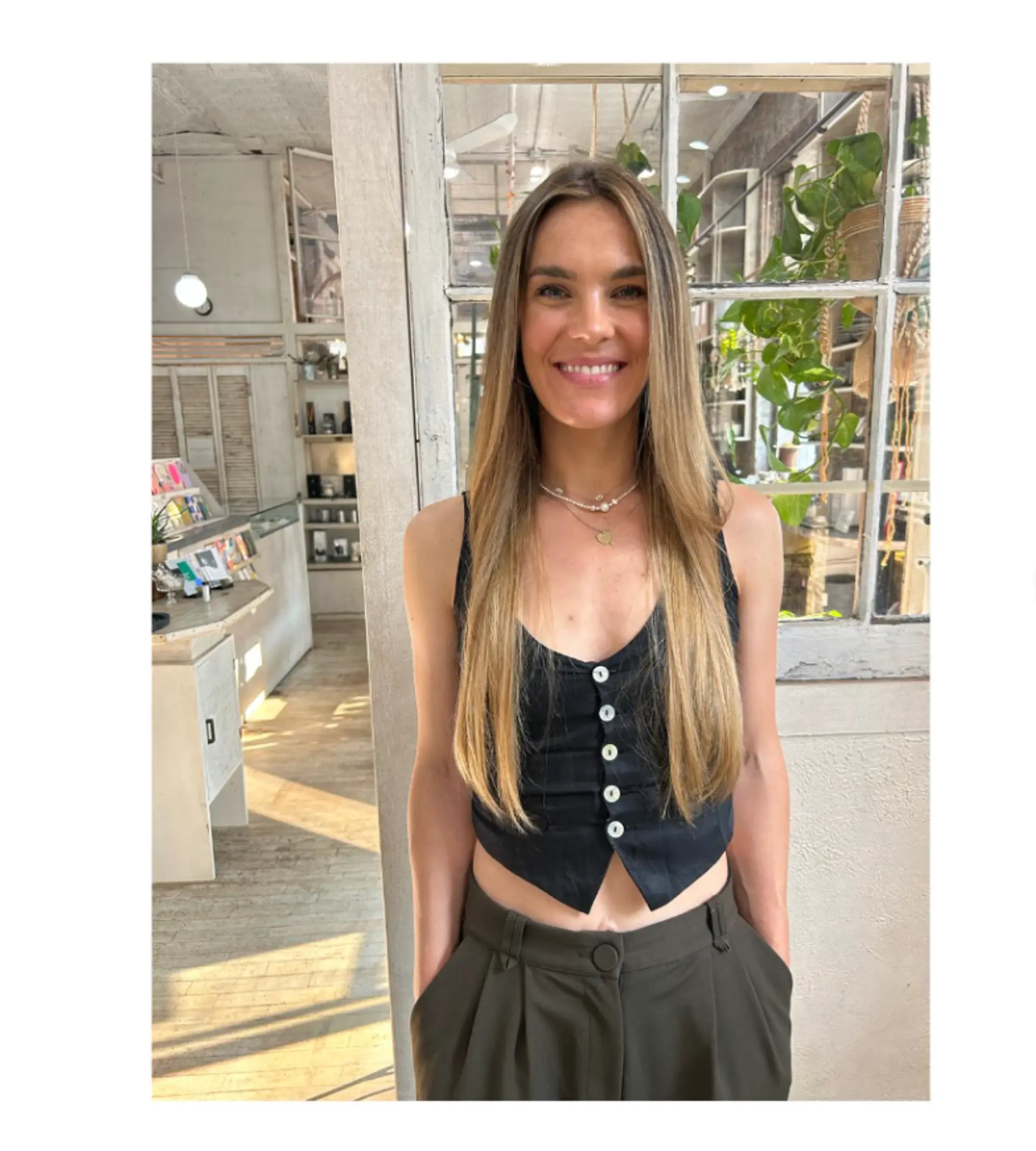 A layered long hairstyle with a blend of blonde and brown tones. 1