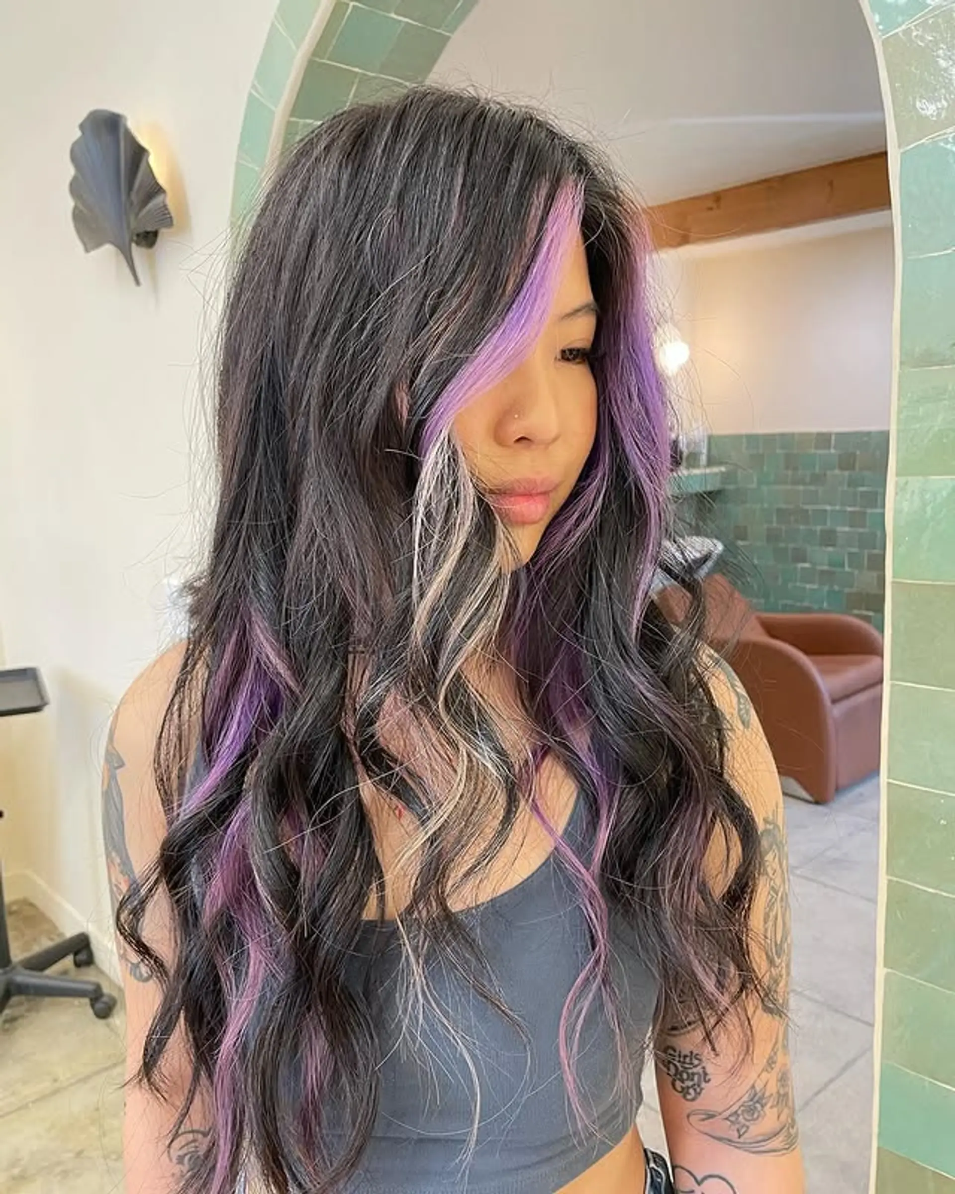 Long wavy hair with face-framing lavender and blonde highlights on a black base. 1