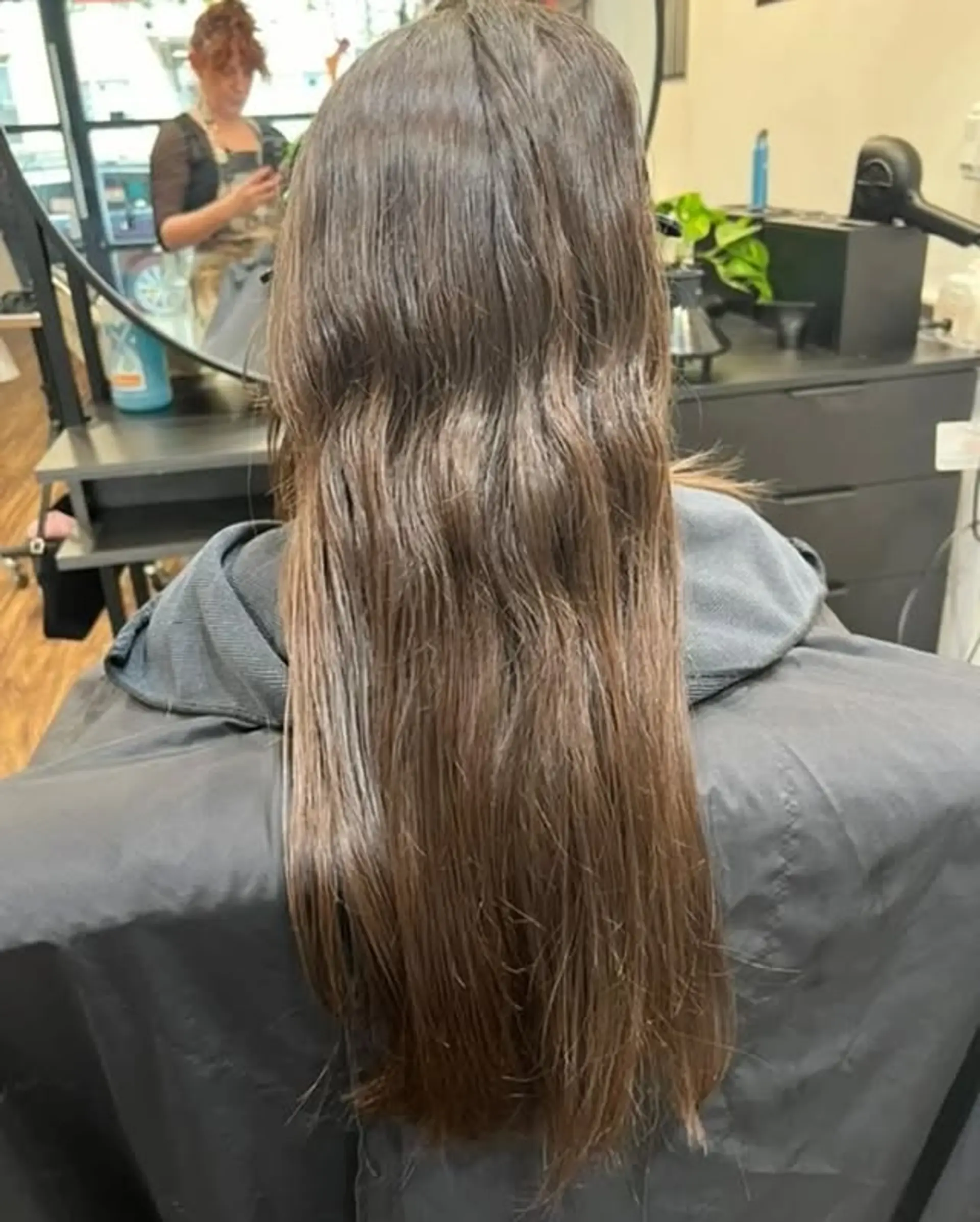 Long layered haircut to frame the face. 1