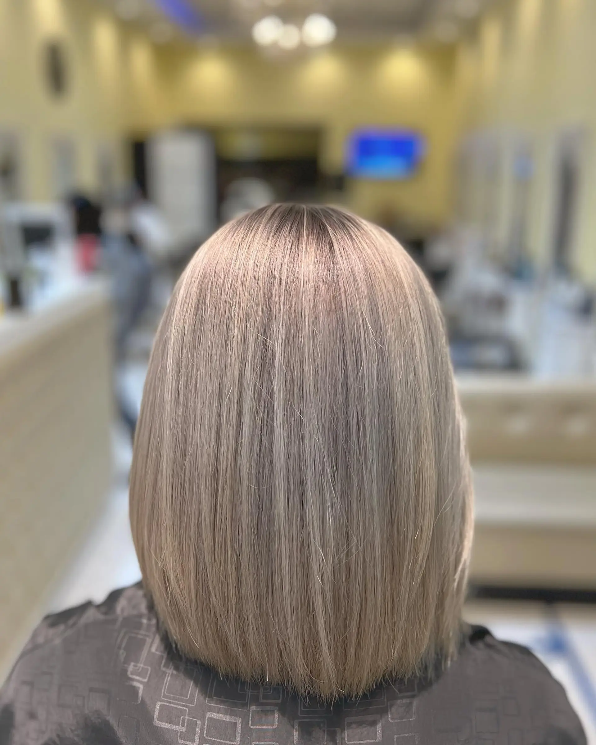 A sleek, blunt bob in a cool-toned ash blonde. 1