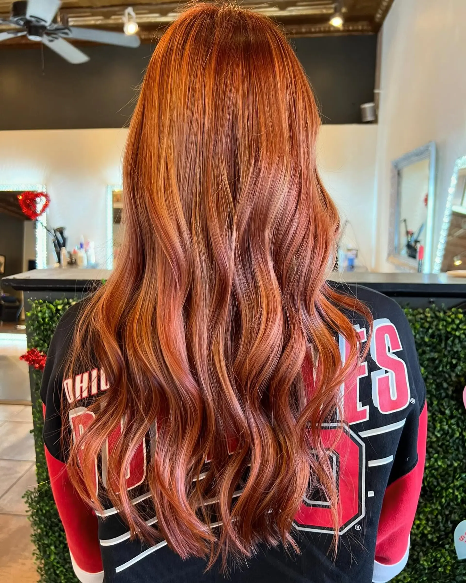 Vibrant, rich copper hair falling in soft, loose waves past mid-back. 1